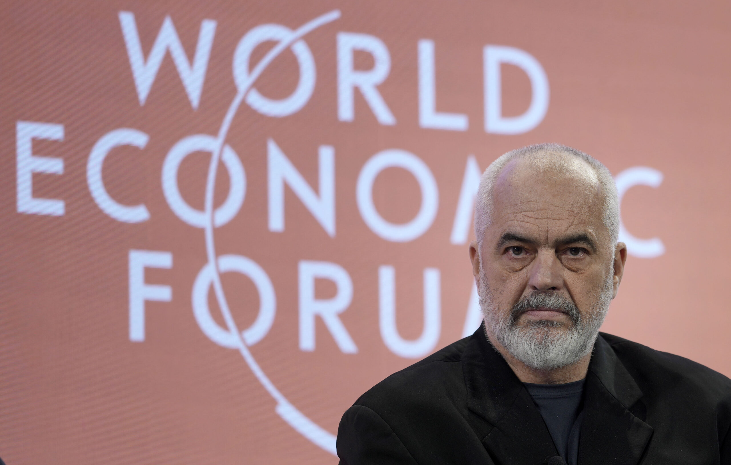 Prime Minister of Albania Edi Rama listens at the World Economic Forum in Davos, Switzerland Thursday, Jan. 19, 2023. The annual meeting of the World Economic Forum is taking place in Davos from Jan. 16 until Jan. 20, 2023. (AP Photo/Markus Schreiber)