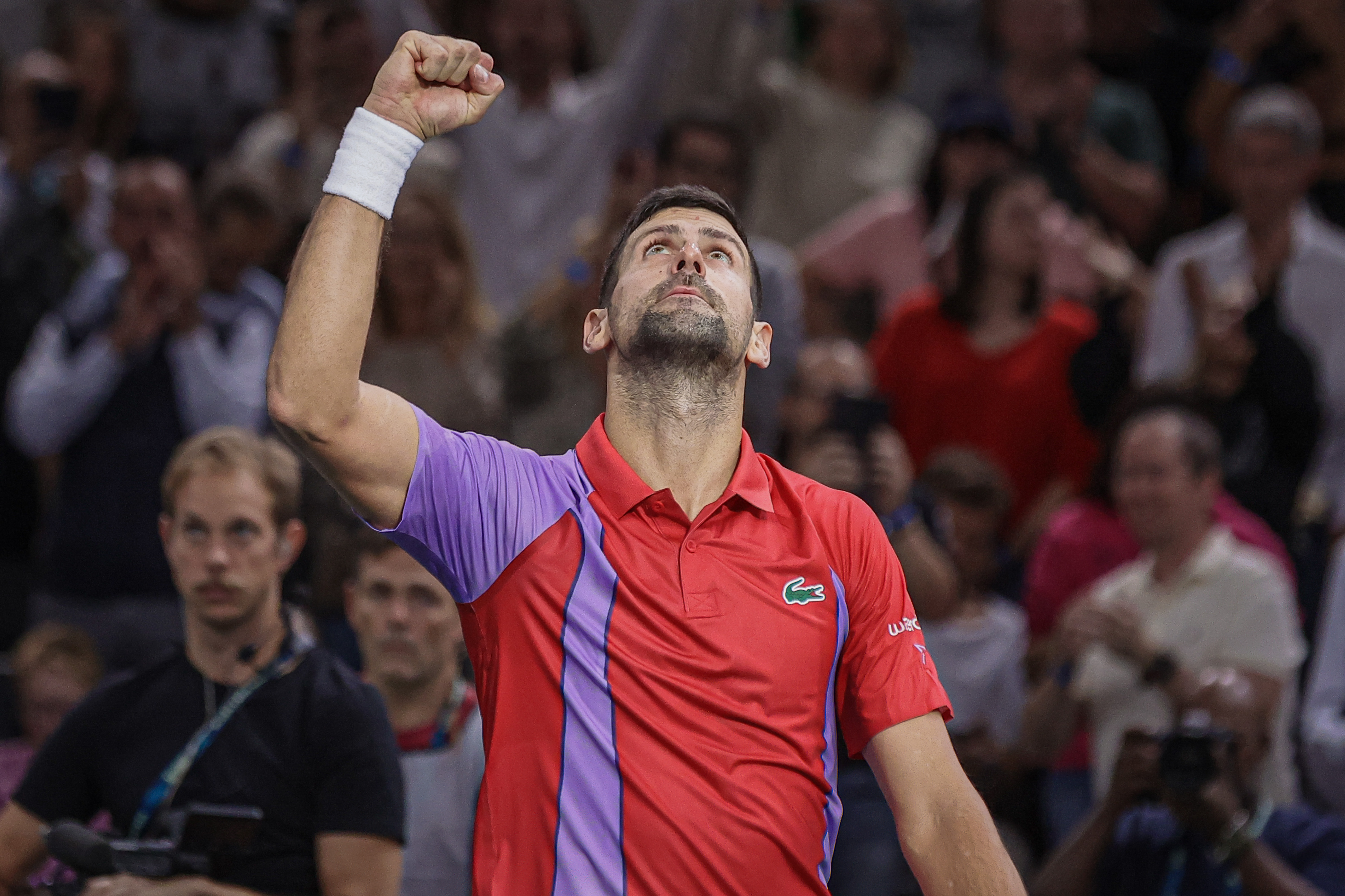 epa10955338 Novak Djokovic of Serbia reacts after winning his round of 16 match against Tallon Griekspoor of the Netherlands at the Rolex Paris Masters tennis tournament in Paris, France, 02 November 2023.  EPA-EFE/CHRISTOPHE PETIT TESSON