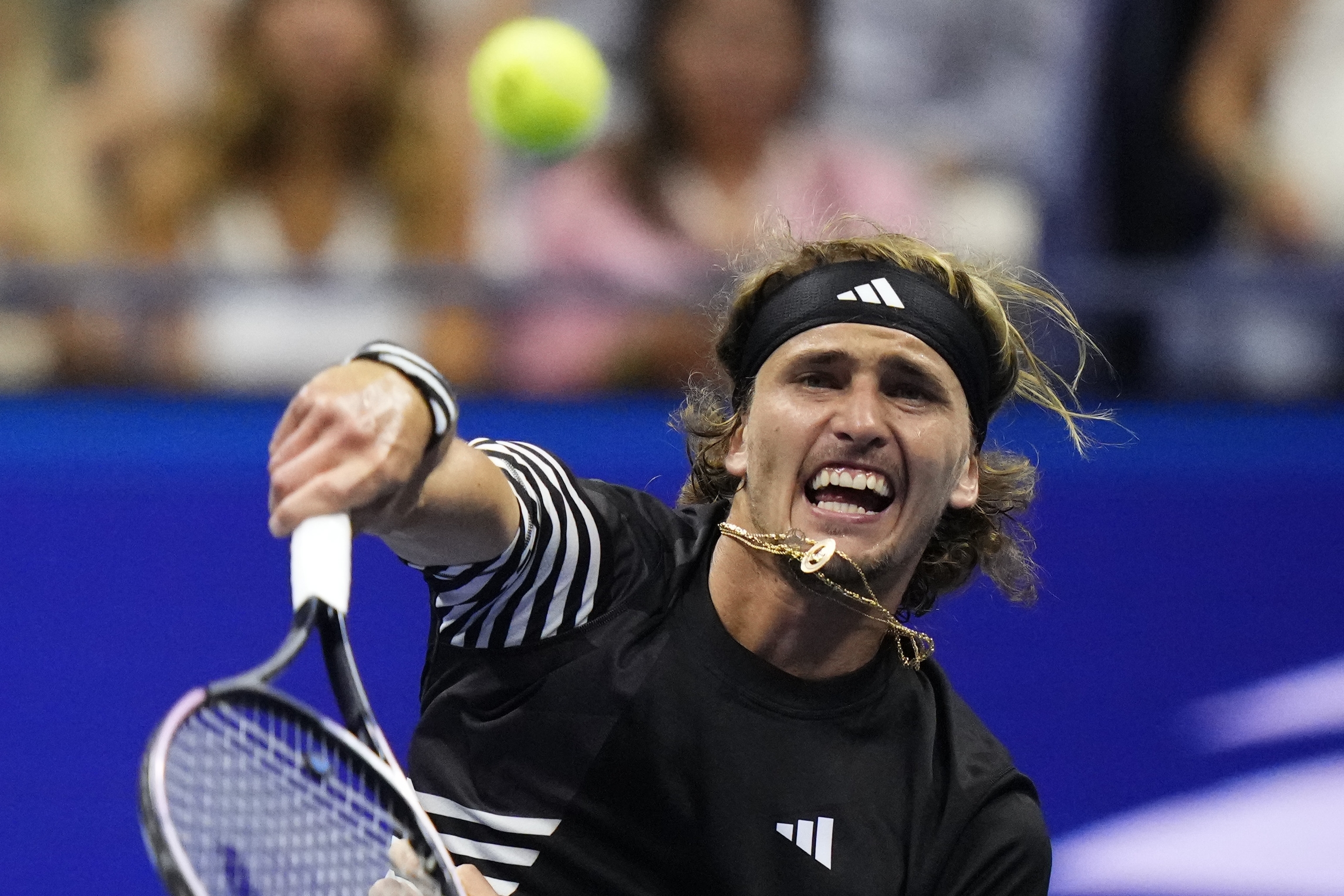 Alexander Zverev, of Germany, serves to Carlos Alcaraz, of Spain, during the quarterfinals of the U.S. Open tennis championships, Wednesday, Sept. 6, 2023, in New York. (AP Photo/Frank Franklin II)