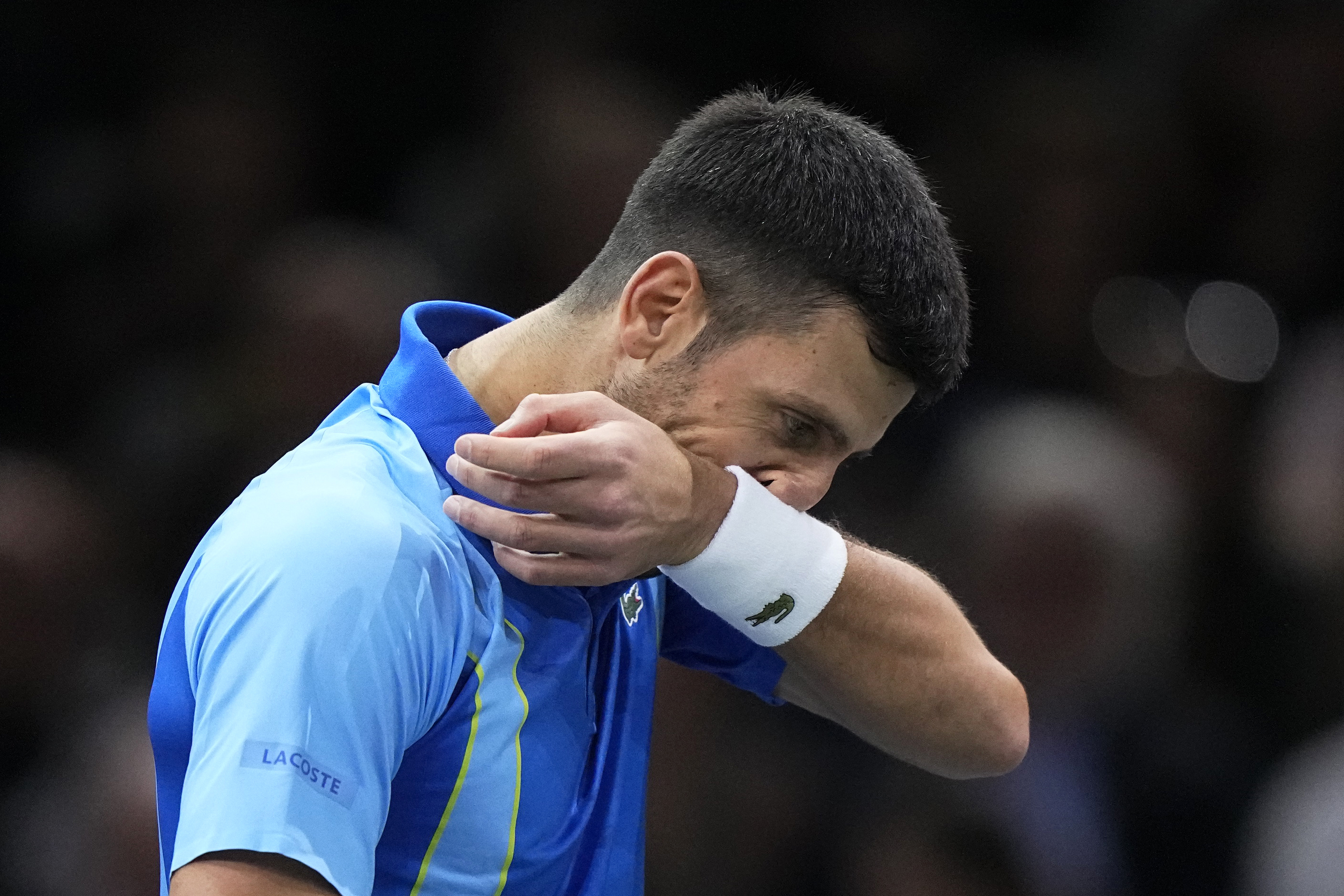 Serbia's Novak Djokovic reacts during the quarterfinal match against Denmark's Holger Rune of the Paris Masters tennis tournament, at the Accor Arena in Paris, Friday, Nov. 3, 2023. (AP Photo/Michel Euler)