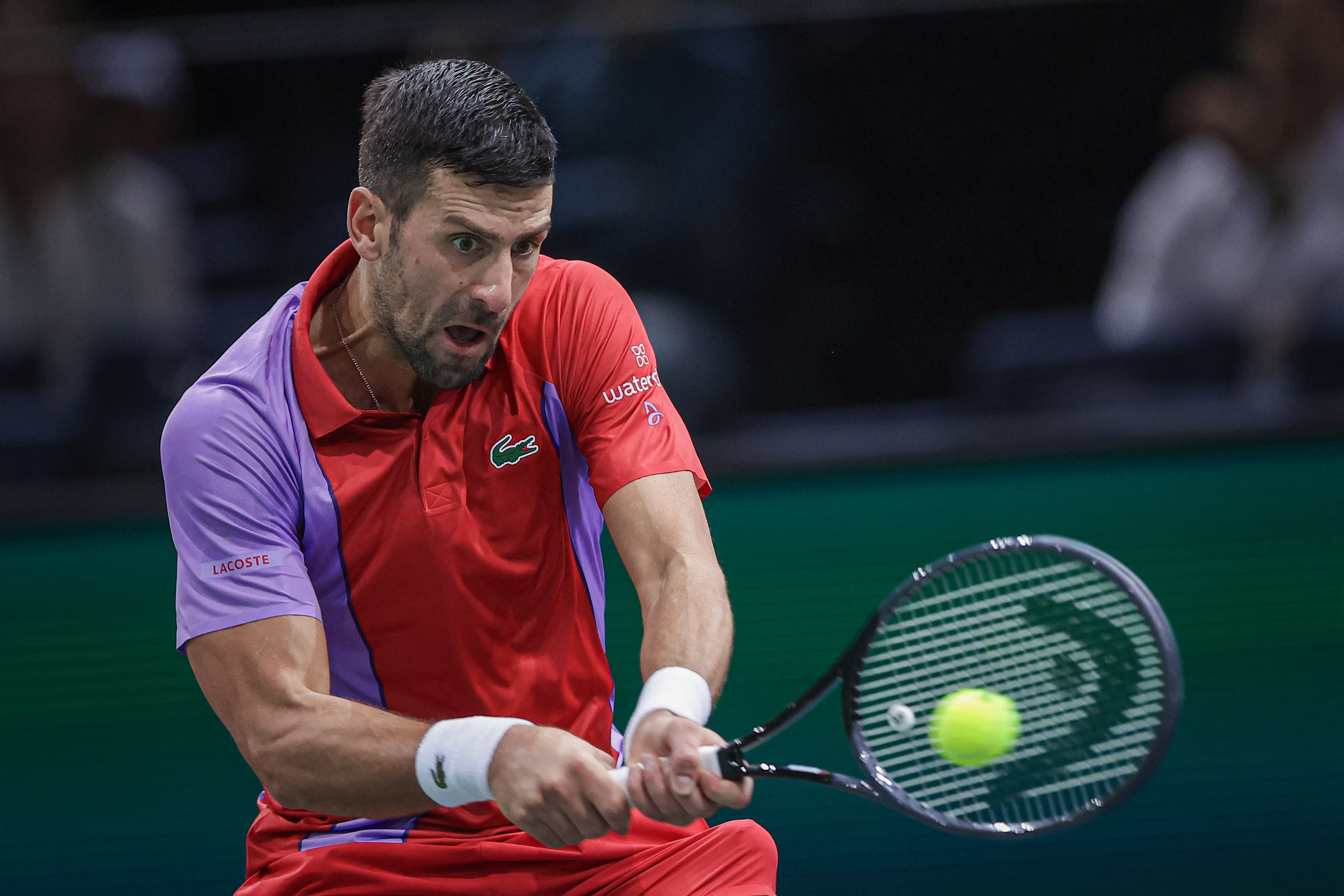 epa10955193 Novak Djokovic of Serbia in action against Tallon Griekspoor of Netherlands during their round of 16 match at the Rolex Paris Masters tennis tournament in Paris, France, 02 November 2023.  EPA-EFE/CHRISTOPHE PETIT TESSON