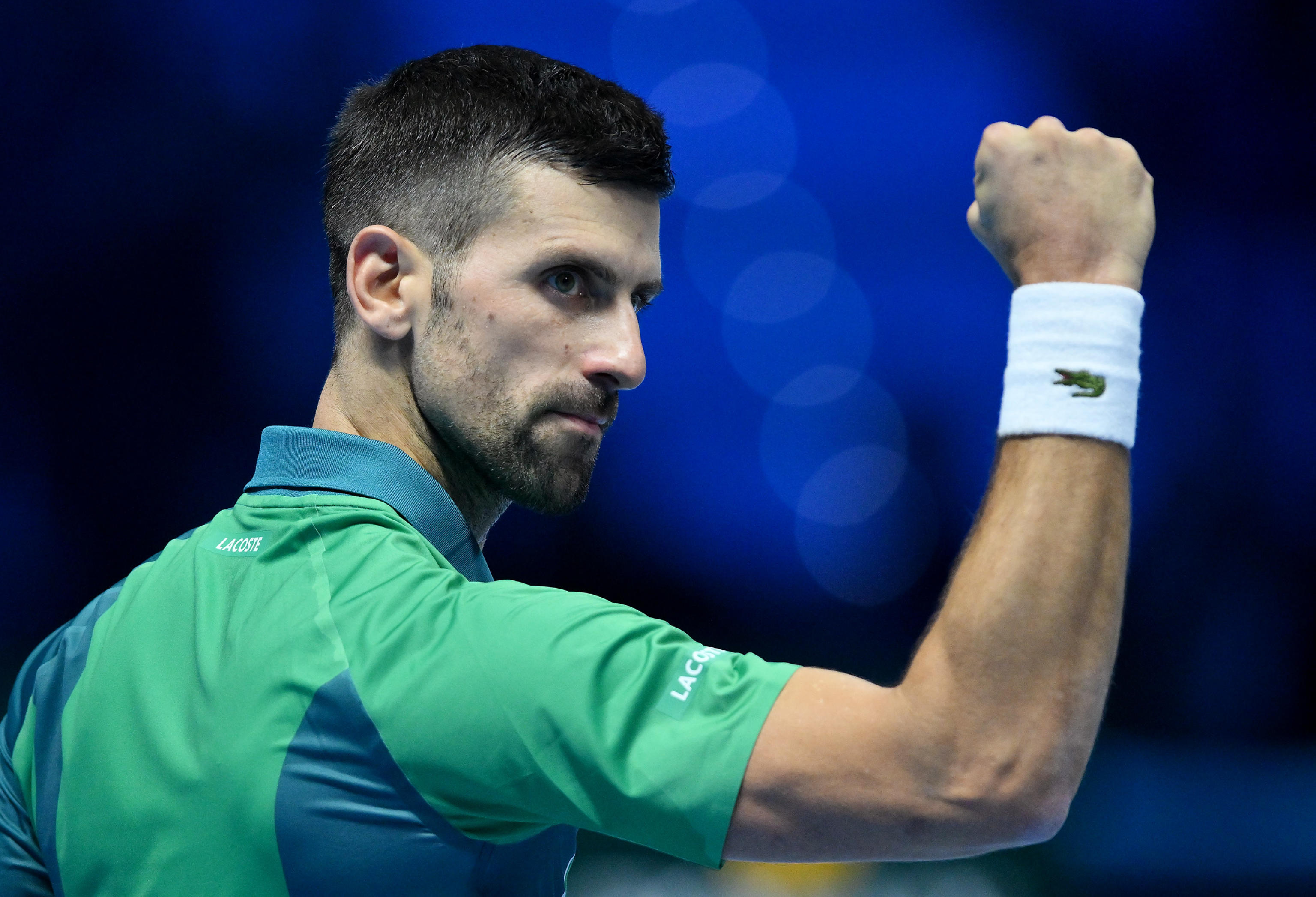 epa10972551 Novak Djokovic of Serbia reacts during his singles match against Holger Rune of Denmark at the Nitto ATP Finals 2023 tennis tournament at the Pala Alpitour arena in Turin, Italy, 12 November 2023.  EPA-EFE/ALESSANDRO DI MARCO