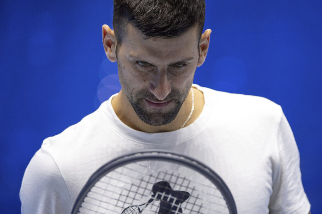 Serbia's Novak Djokovic looks down during a training session ahead of the ATP Finals, in Turin, Italy, Friday, Nov. 10, 2023. (Marco Alpozzi/LaPresse via AP)