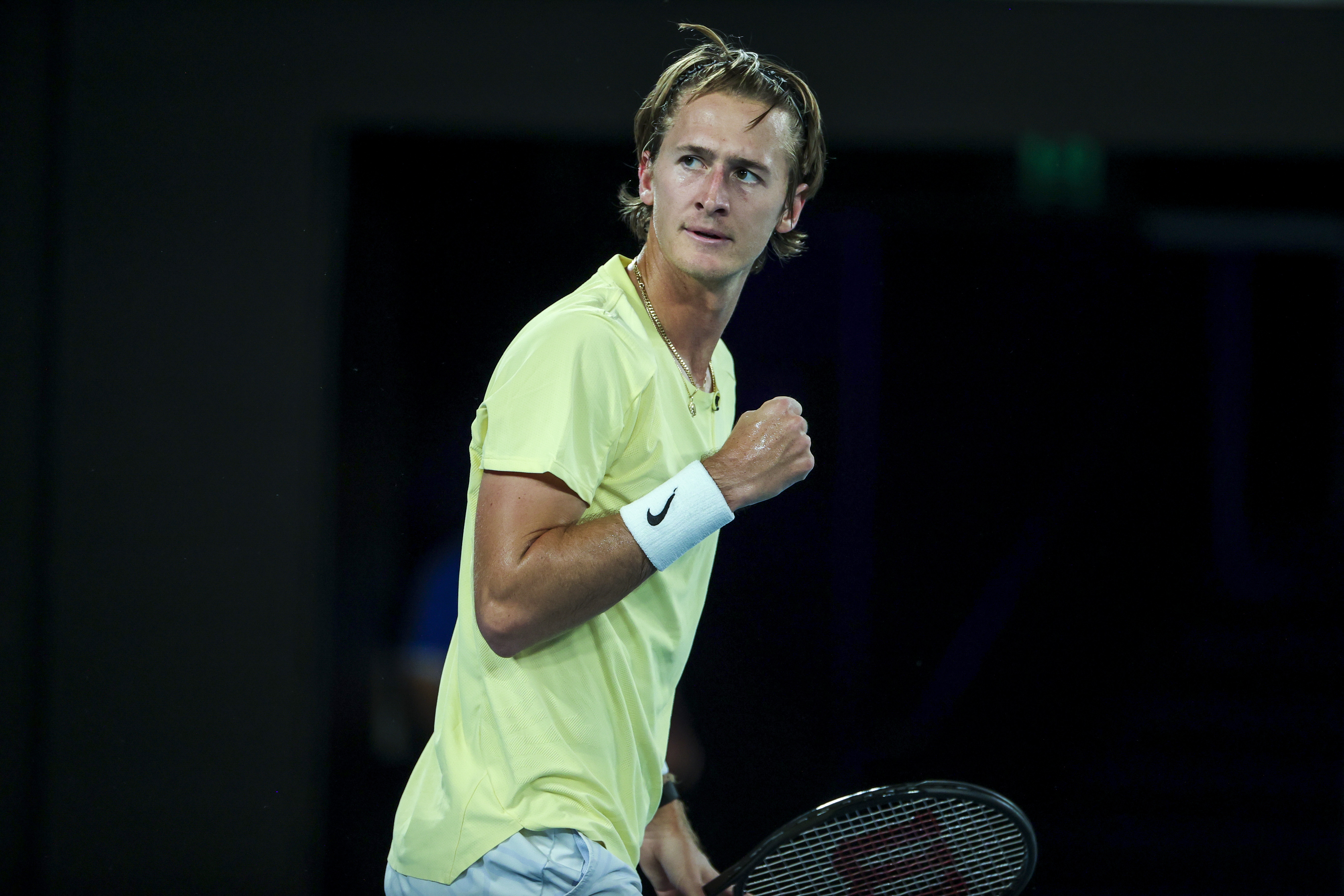 epa10425895 Sebastian Korda of the USA reacts after a point against Karen Khachanov of Russia during their quarterfinal match at the Australian Open tennis tournament in Melbourne, Australia, 24 January 2023.  EPA-EFE/FAZRY ISMAIL