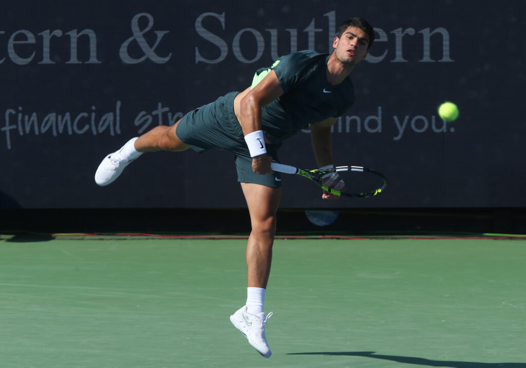 epa10811073 Carlos Alcaraz of Spain serves to Novak Djokovic of Serbia during the finals of the Western and Southern Open at the Lindner Family Tennis Center in Mason, Ohio, USA, 20 August 2023.  EPA-EFE/MARK LYONS