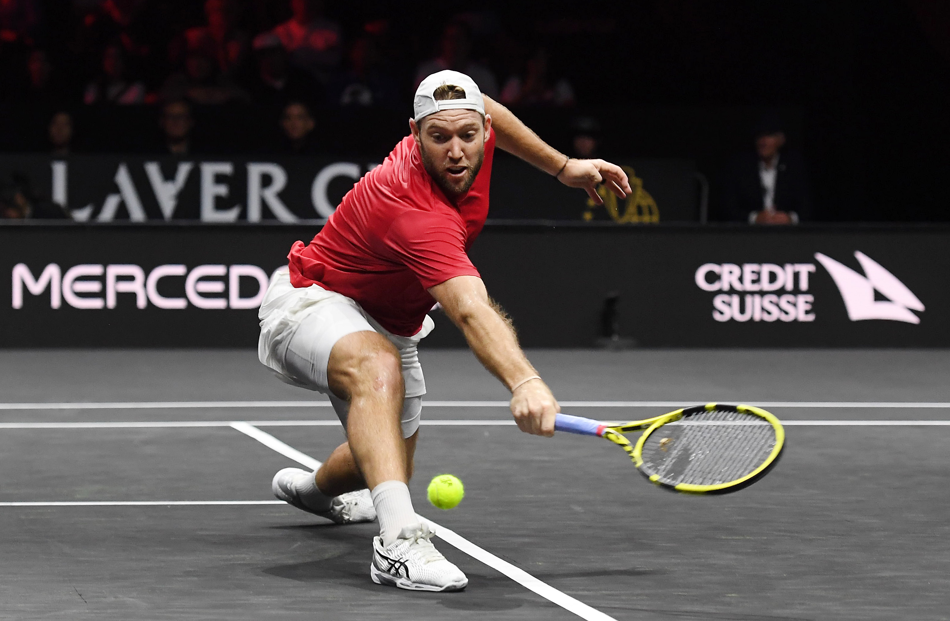 epa10201472 Jack Sock of Team World in action against Casper Ruud of Team Europe during a Laver Cup tennis match at the O2 Arena in London, Britain 23 September 2022.  EPA-EFE/ANDY RAIN