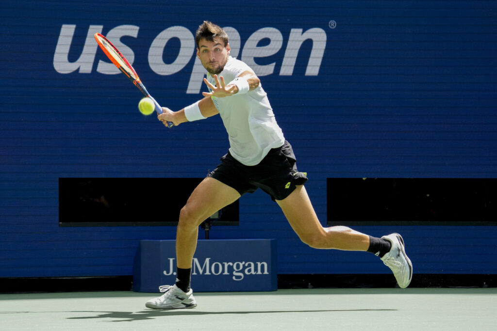 Bernabe Zapata Miralles, of Spain, returns a shot to Novak Djokovic, of Serbia, during the second round of the U.S. Open tennis championships, Wednesday, Aug. 30, 2023, in New York. (AP Photo/John Minchillo)