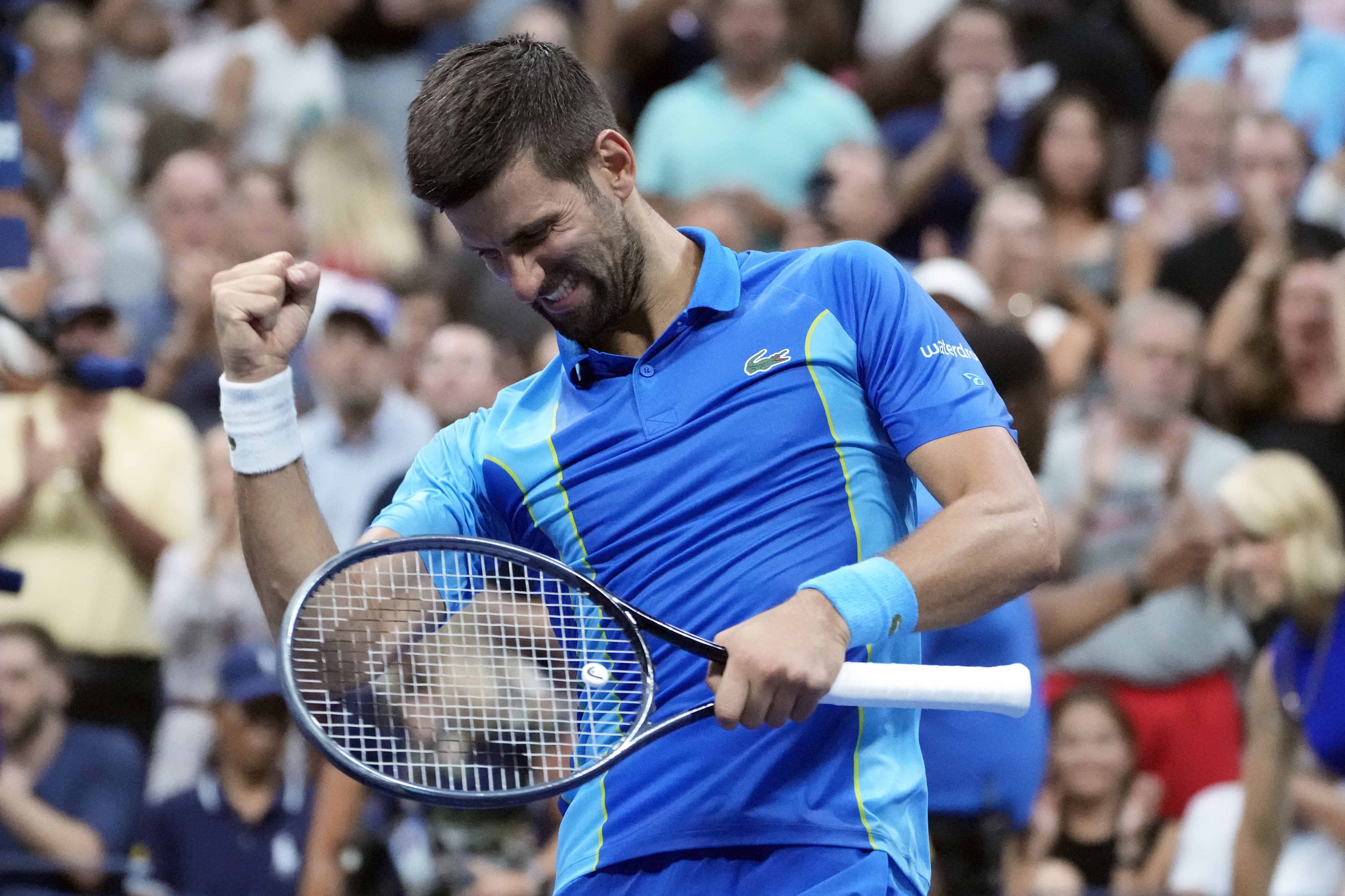 Novak Djokovic, of Serbia, celebrates after defeating Borna Gojo, of Croatia, during the fourth round of the U.S. Open tennis championships, Sunday, Sept. 3, 2023, in New York. (AP Photo/John Minchillo)