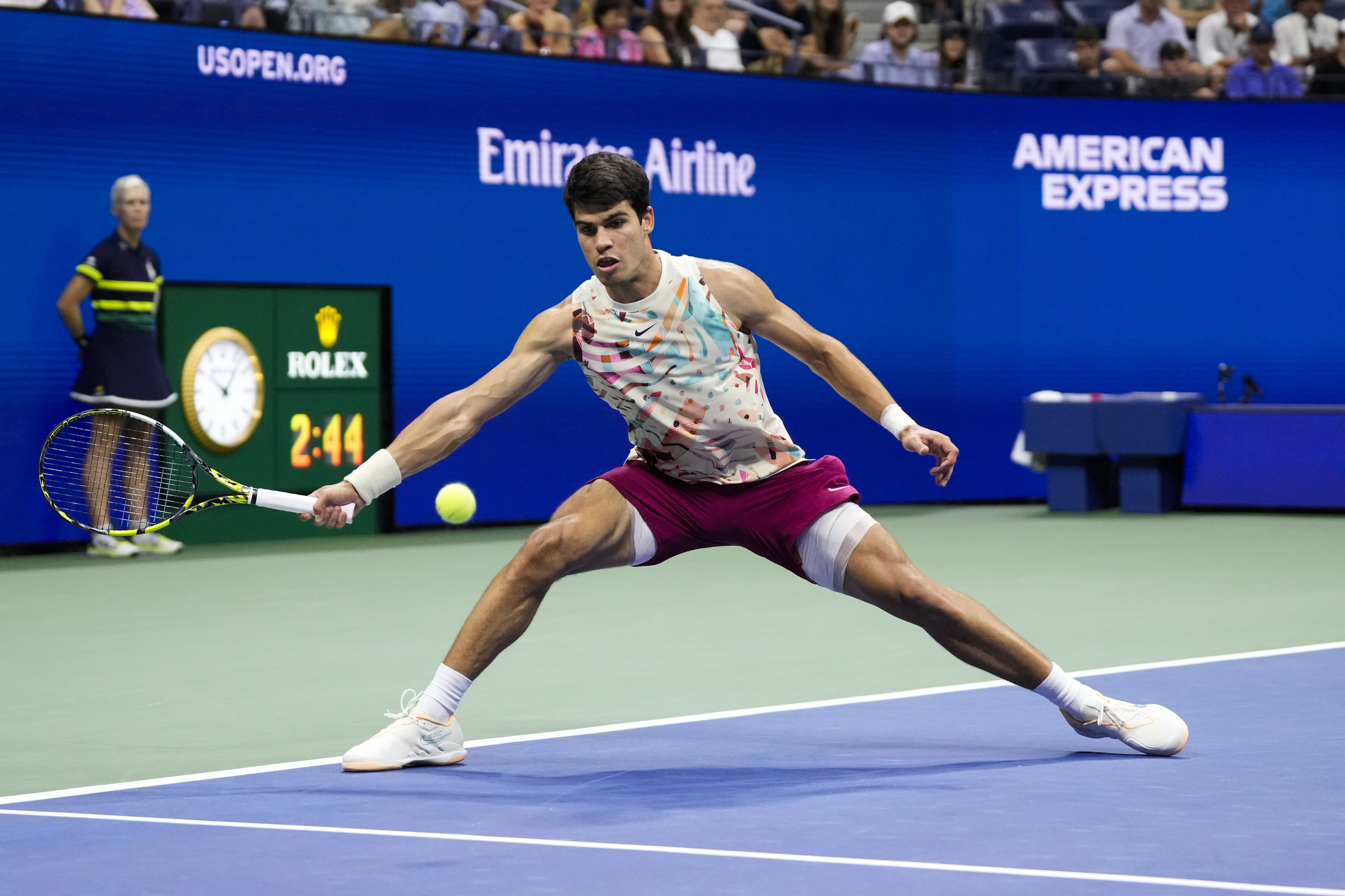 Carlos Alcaraz, of Spain, returns a shot to Daniil Medvedev, of Russia, during the men's singles semifinals of the U.S. Open tennis championships, Friday, Sept. 8, 2023, in New York. (AP Photo/John Minchillo)