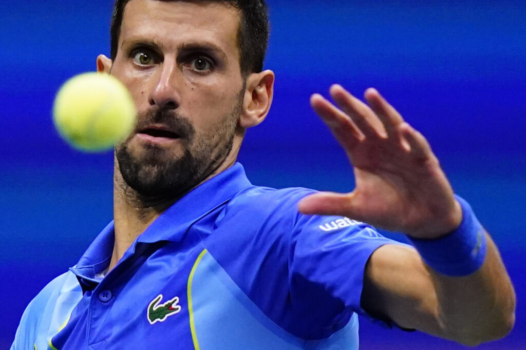 Novak Djokovic, of Serbia, returns a shot to Daniil Medvedev, of Russia, during the men's singles final of the U.S. Open tennis championships, Sunday, Sept. 10, 2023, in New York. (AP Photo/Frank Franklin II)