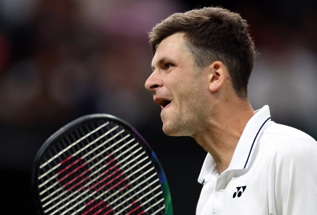 epa10736788 Hubert Hurkacz of Poland reacts as he plays Novak Djokovic of Serbia in the Men's Singles 4th round match at the Wimbledon Championships, Wimbledon, Britain, 09 July 2023.  EPA-EFE/ISABEL INFANTES   EDITORIAL USE ONLY
