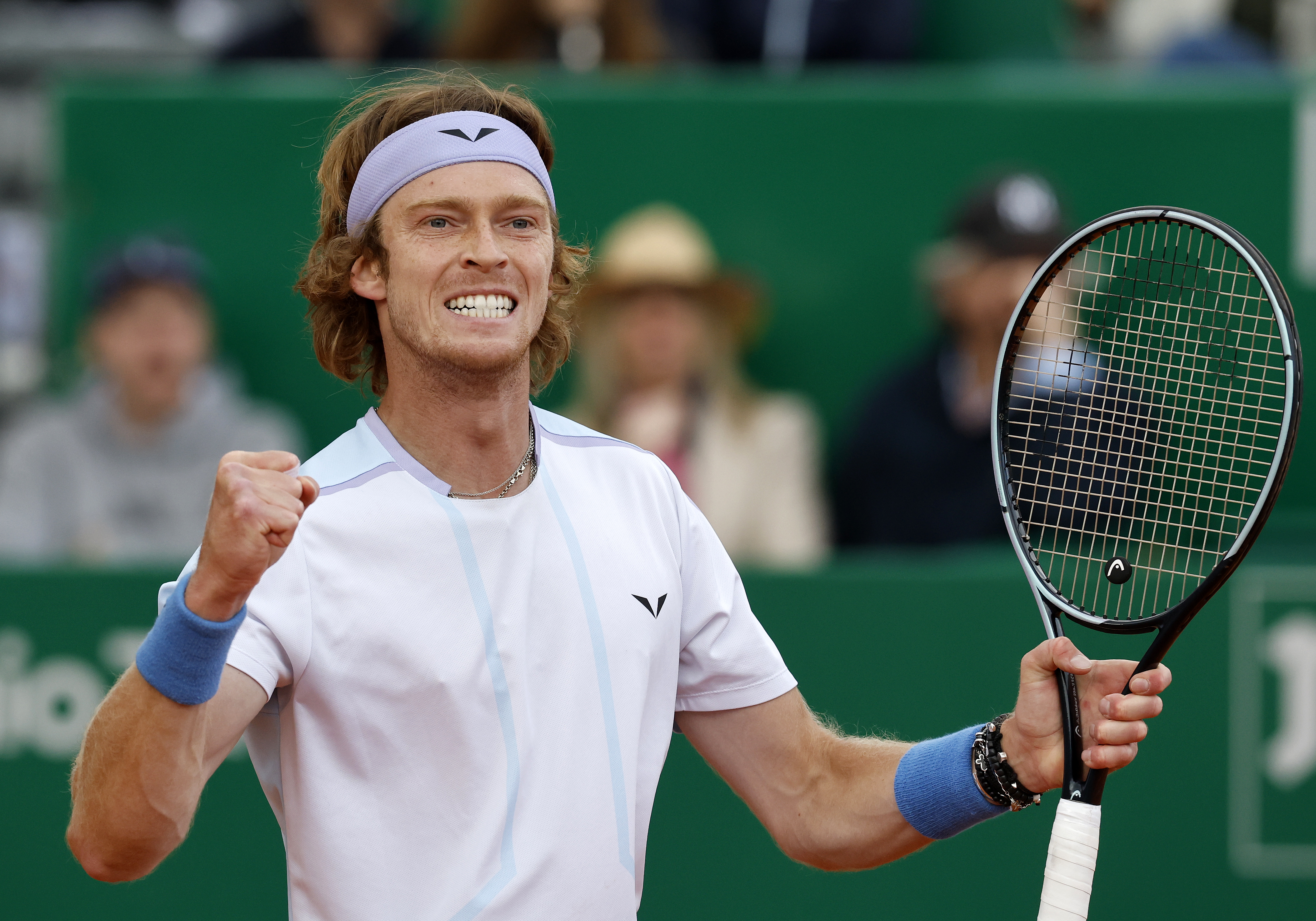 epa10574051 Andrey Rublev of Russia celebrates winning against Taylor Fritz of the US during their semi final match at the Monte-Carlo Rolex Masters tournament in Roquebrune Cap Martin, France, 15 April 2023.  EPA-EFE/SEBASTIEN NOGIER