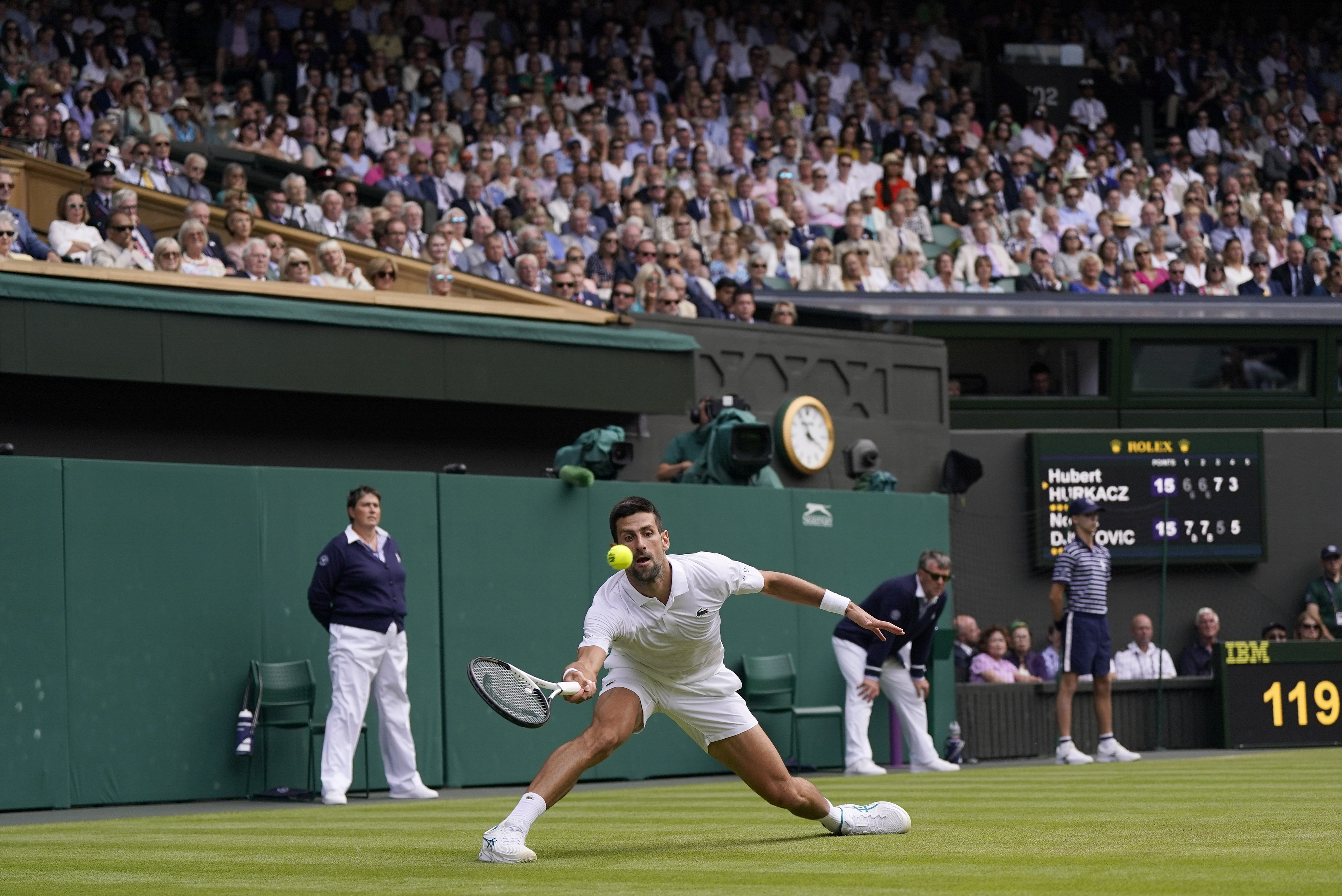 Serbia's Novak Djokovic returns to Poland's Hubert Hurkacz in a men's singles match on day eight of the Wimbledon tennis championships in London, Monday, July 10, 2023. (AP Photo/Alberto Pezzali)