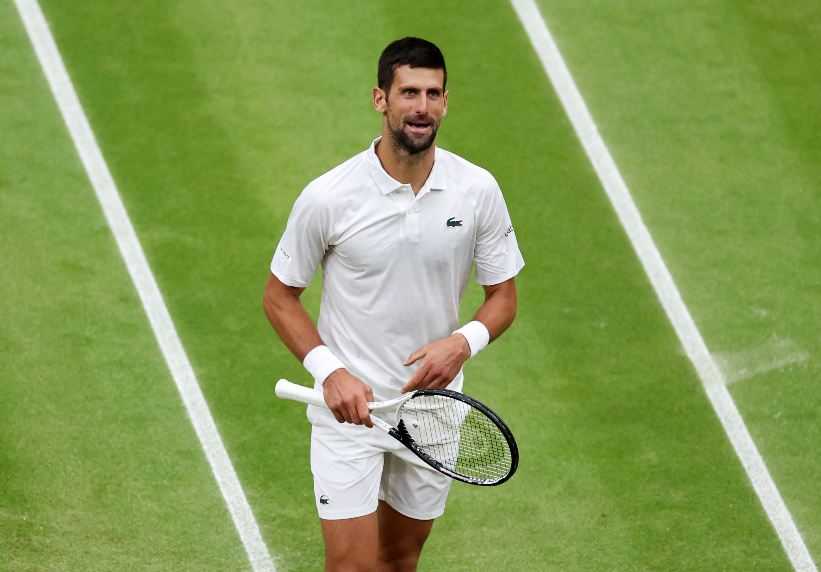 epa10746179 Novak Djokovic of Serbia reacts during his Men's Singles semi-final match against Jannik Sinnner of Italy at the Wimbledon Championships, Wimbledon, Britain, 14 July 2023.  EPA-EFE/ISABEL INFANTES   EDITORIAL USE ONLY
