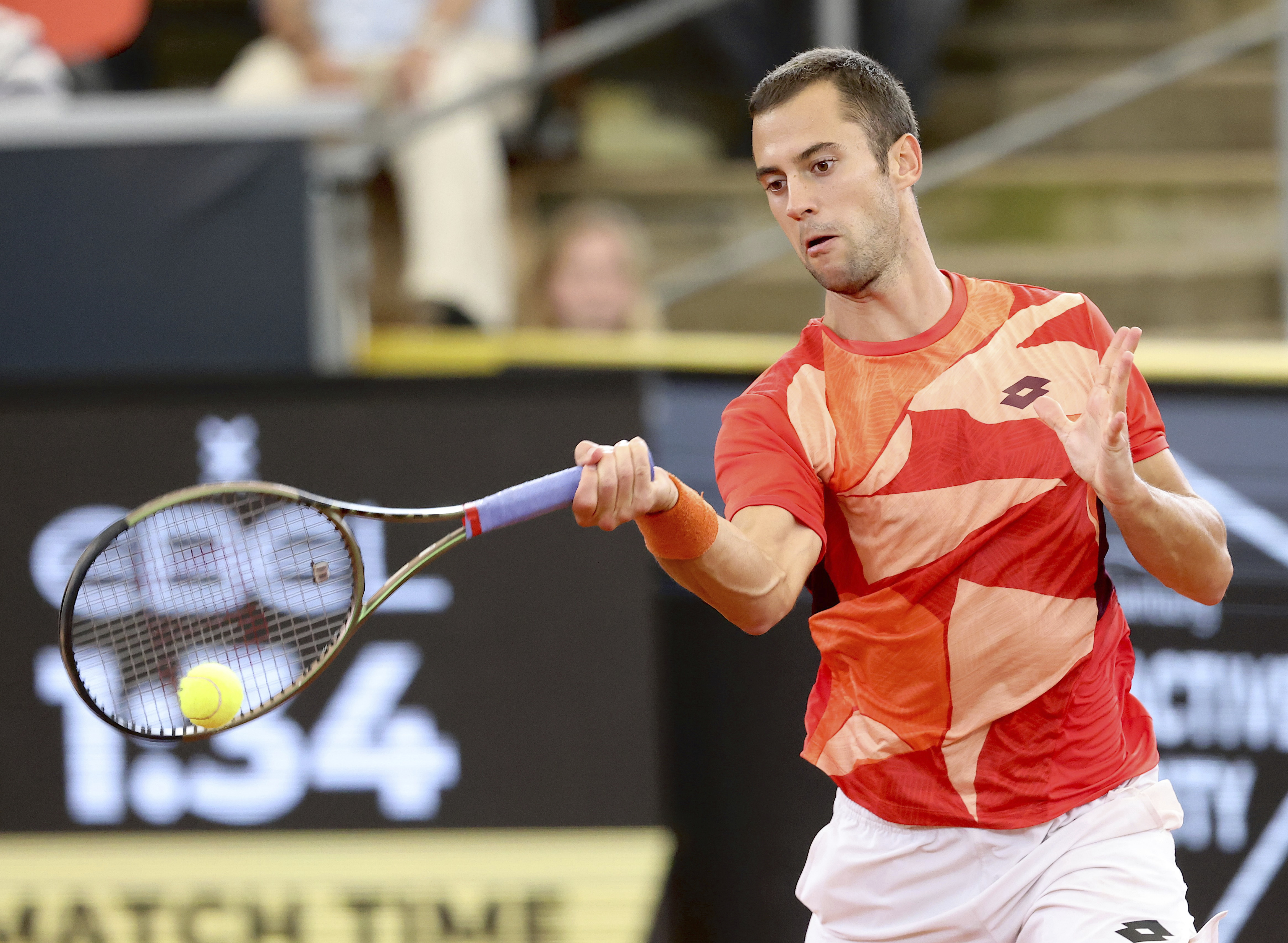 Serbia's Laslo Djere returns a ball to Germany's Alexander Zverev during the men's singles final of the Hamburg European Open ATP tournament, at the Rothenbaum Tennis Stadium, in Hamburg, Germany, Sunday, July 30, 2023. (Frank Molter/dpa via AP)