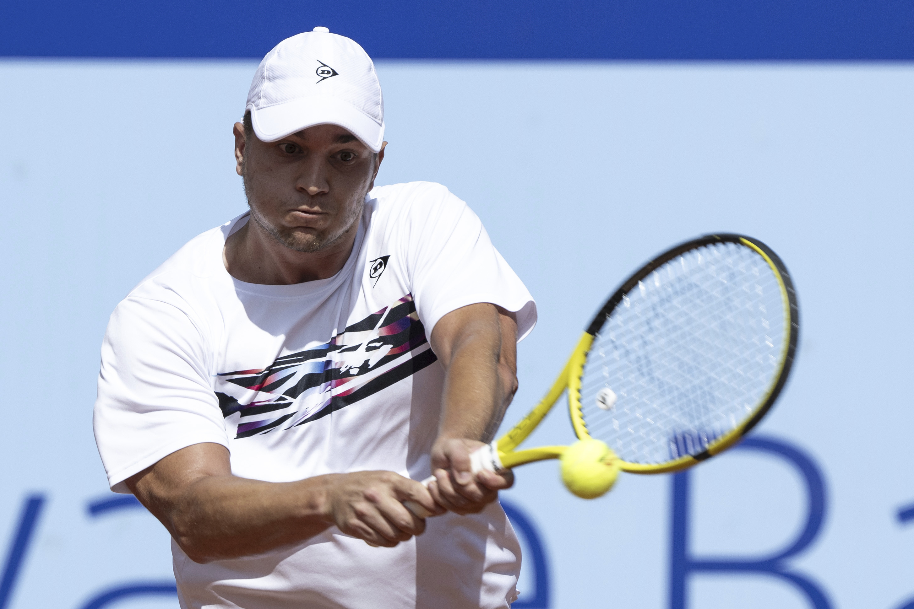 Serbia's Miomir Kecmanovic returns the ball to Spain's Albert Ramos-Vinolas during their semi final match at the Swiss Open tennis tournament in Gstaad, Switzerland, on Saturday, July 22, 2023. (Peter Schneider/Keystone via AP)