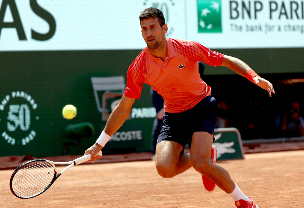 epa10675906 Novak Djokovic of Serbia plays Karen Khachanov of Russia in their Men's quarterfinal match during the French Open Grand Slam tennis tournament at Roland Garros in Paris, France, 06 June 2023.  EPA-EFE/MOHAMMED BADRA