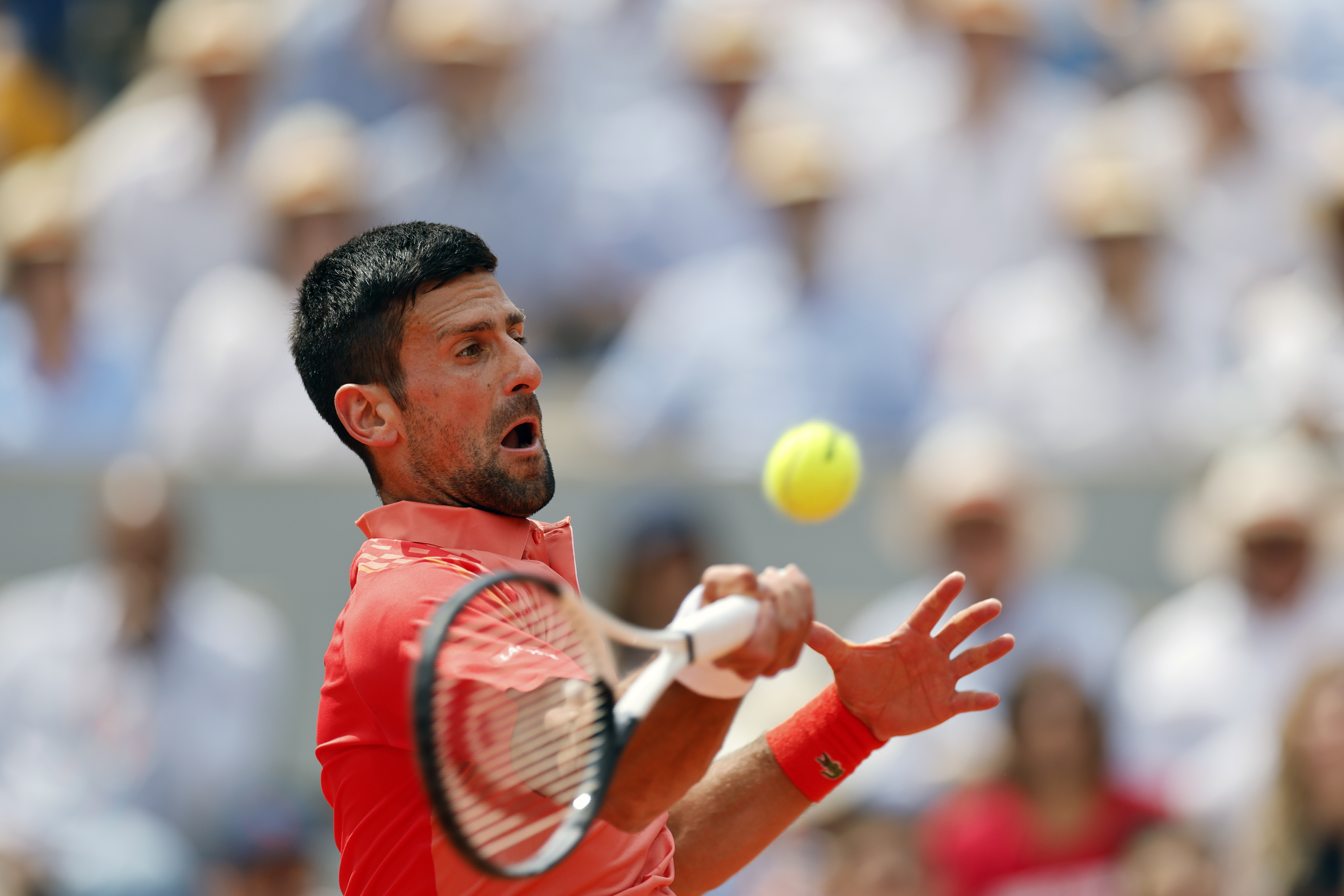 Serbia's Novak Djokovic plays a shot against Spain's Carlos Alcaraz during their semifinal match of the French Open tennis tournament at the Roland Garros stadium in Paris, Friday, June 9, 2023. (AP Photo/Jean-Francois Badias)