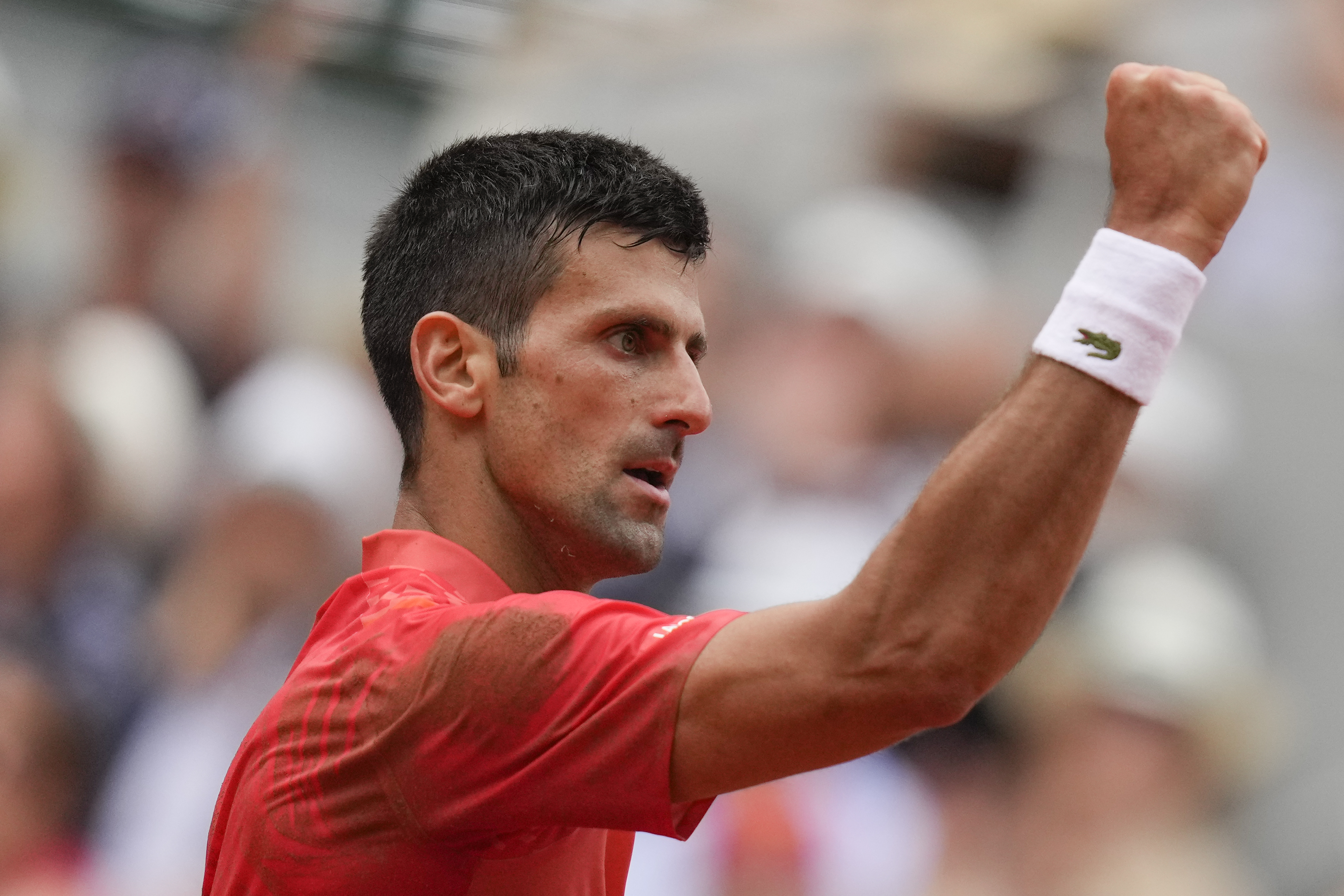 Serbia's Novak Djokovic clenches his fist after scoring a point against Norway's Casper Ruud during the men's singles final match of the French Open tennis tournament at the Roland Garros stadium in Paris, Sunday, June 11, 2023. (AP Photo/Thibault Camus)