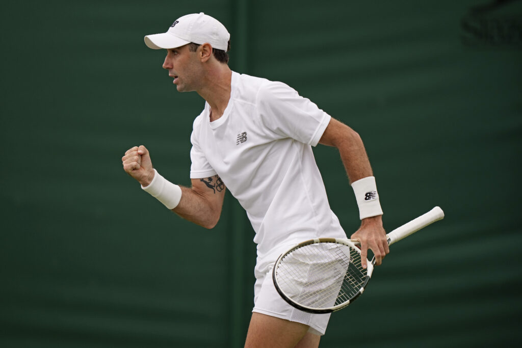 Australia's Jordan Thompson celebrates winning a point against Brandon Nakashima of the US during a first round men's singles match on day one of the Wimbledon tennis championships in London, Monday, July 3, 2023. (AP Photo/Alberto Pezzali)