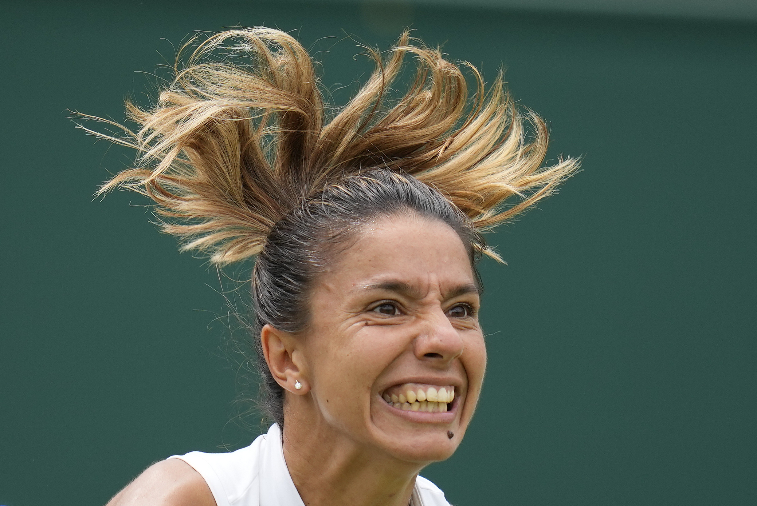 Serbia's Natalija Stevanovic serves to Czech Republic's Petra Kvitova in a women's singles match on day six of the Wimbledon tennis championships in London, Saturday, July 8, 2023. (AP Photo/Kirsty Wigglesworth)
