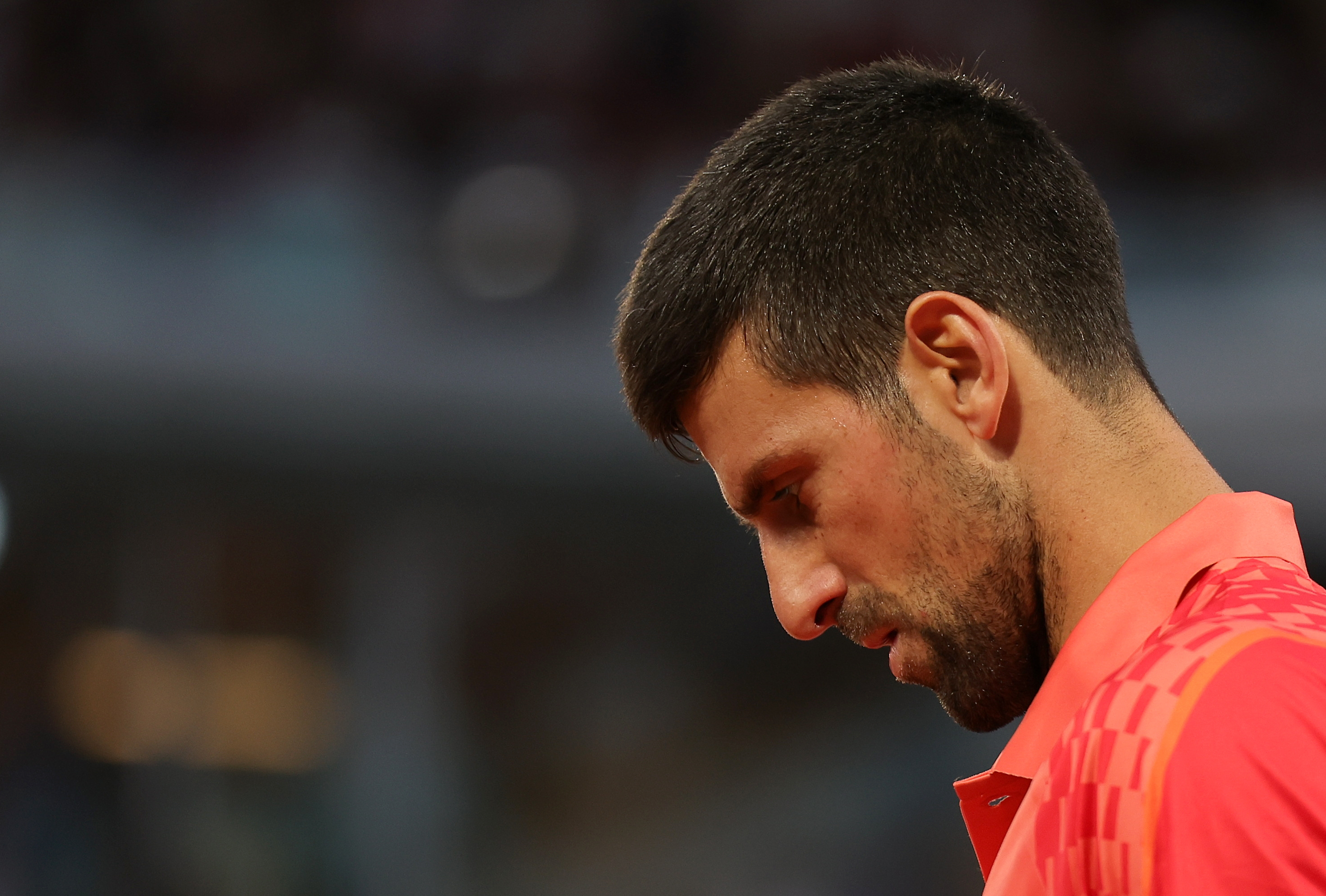 epa10665539 Novak Djokovic of Serbia reacts as he plays Marton Fucsovics of Hungary in their Men's Singles second round match during the French Open Grand Slam tennis tournament at Roland Garros in Paris, France, 31 May 2023.  EPA-EFE/TERESA SUAREZ