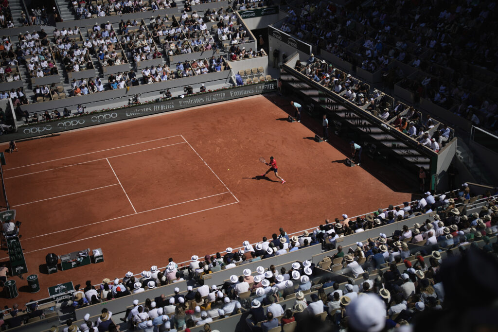 Serbia's Novak Djokovic plays a shot against Spain's Alejandro Davidovich Fokina during their third round match of the French Open tennis tournament at the Roland Garros stadium in Paris, Friday, June 2, 2023. (AP Photo/Christophe Ena)