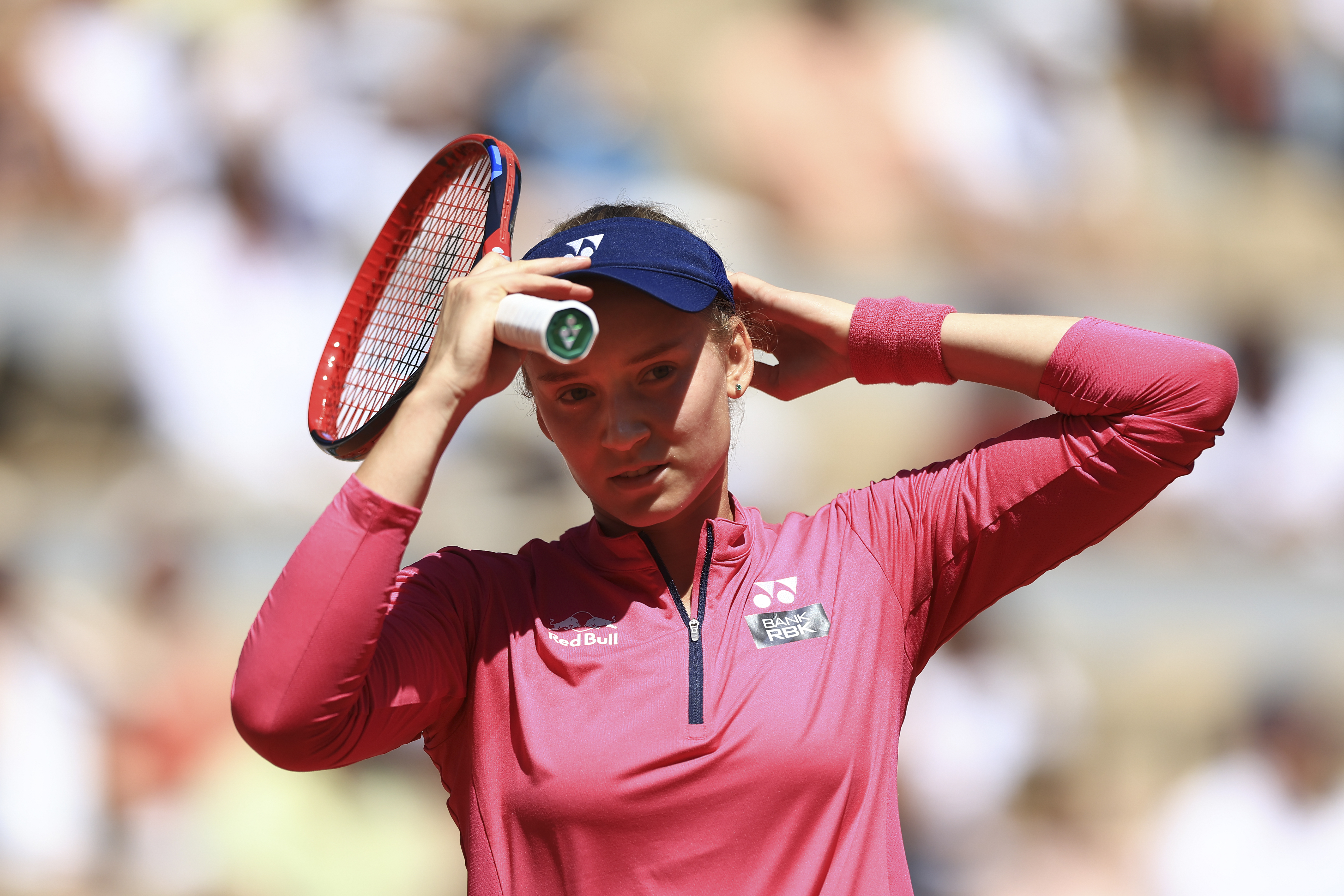 Kazakhstan's Elena Rybakina adjusts her cap during the second round match of the French Open tennis tournament against Linda Noskova of the Czech Republic at the Roland Garros stadium in Paris, Thursday, June 1, 2023. (AP Photo/Aurelien Morissard)
