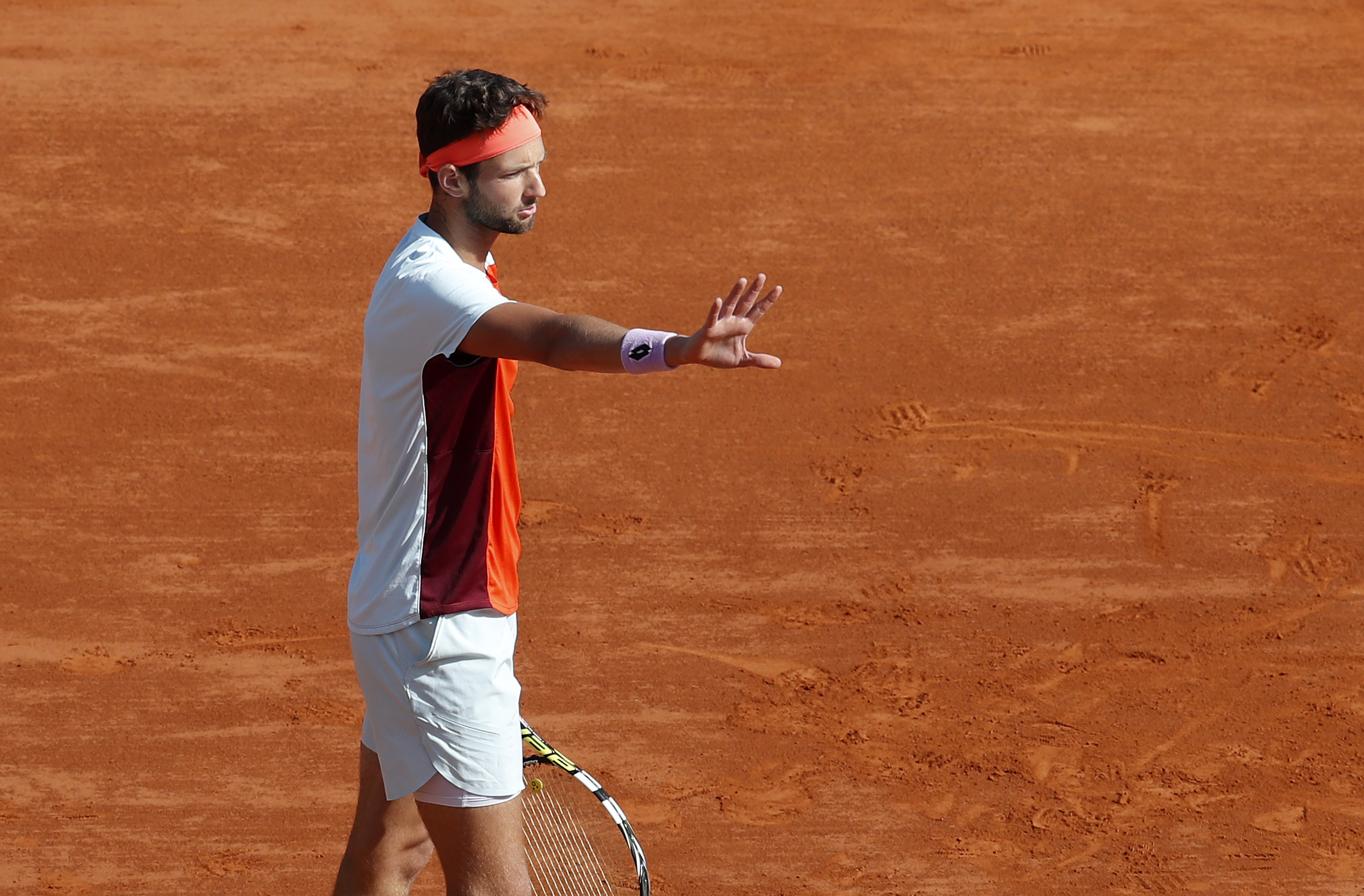 epa10568450 Ivan Gakhov reacts during his match against Novak Djokovic of Serbia during their first round match at the Monte-Carlo Rolex Masters tournament in Roquebrune Cap Martin, France, 11 April 2023.  EPA-EFE/SEBASTIEN NOGIER