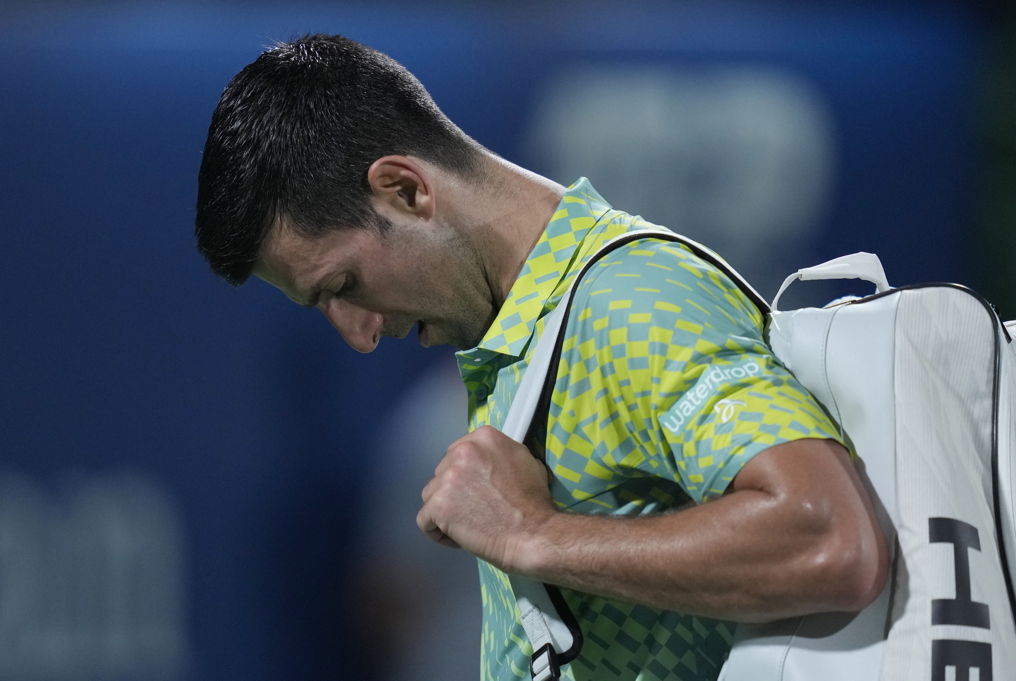 Serbia's Novak Djokovic reacts after he lost their semi final match against Daniil Medvedev at the Dubai Duty Free Tennis Championships in Dubai, United Arab Emirates, Friday, March 2, 2023. (AP Photo/Kamran Jebreili)