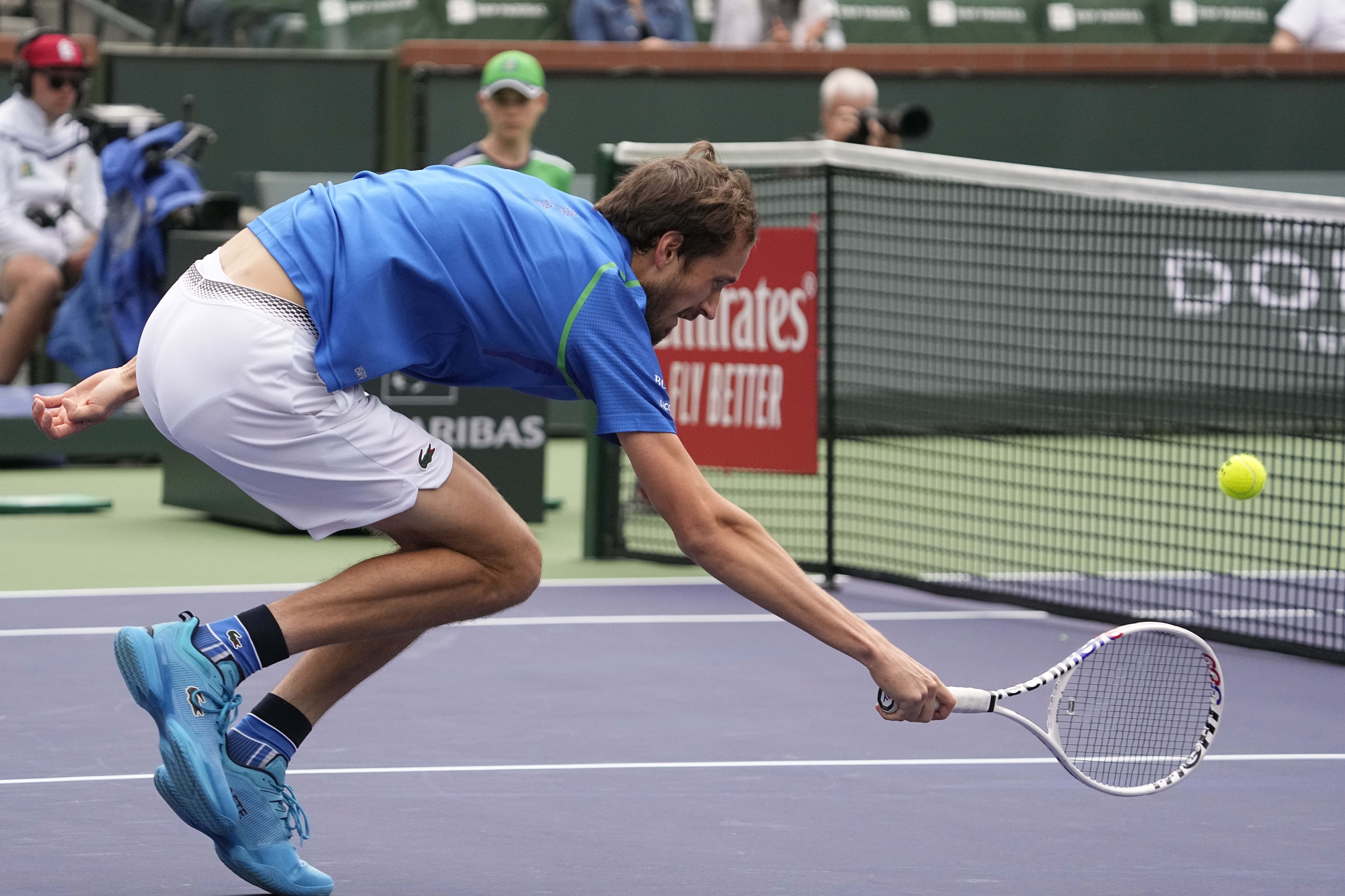 Daniil Medvedev, of Russia, returns a shot to Alexander Zverev, of Germany, at the BNP Paribas Open tennis tournament Tuesday, March 14, 2023, in Indian Wells, Calif. (AP Photo/Mark J. Terrill)