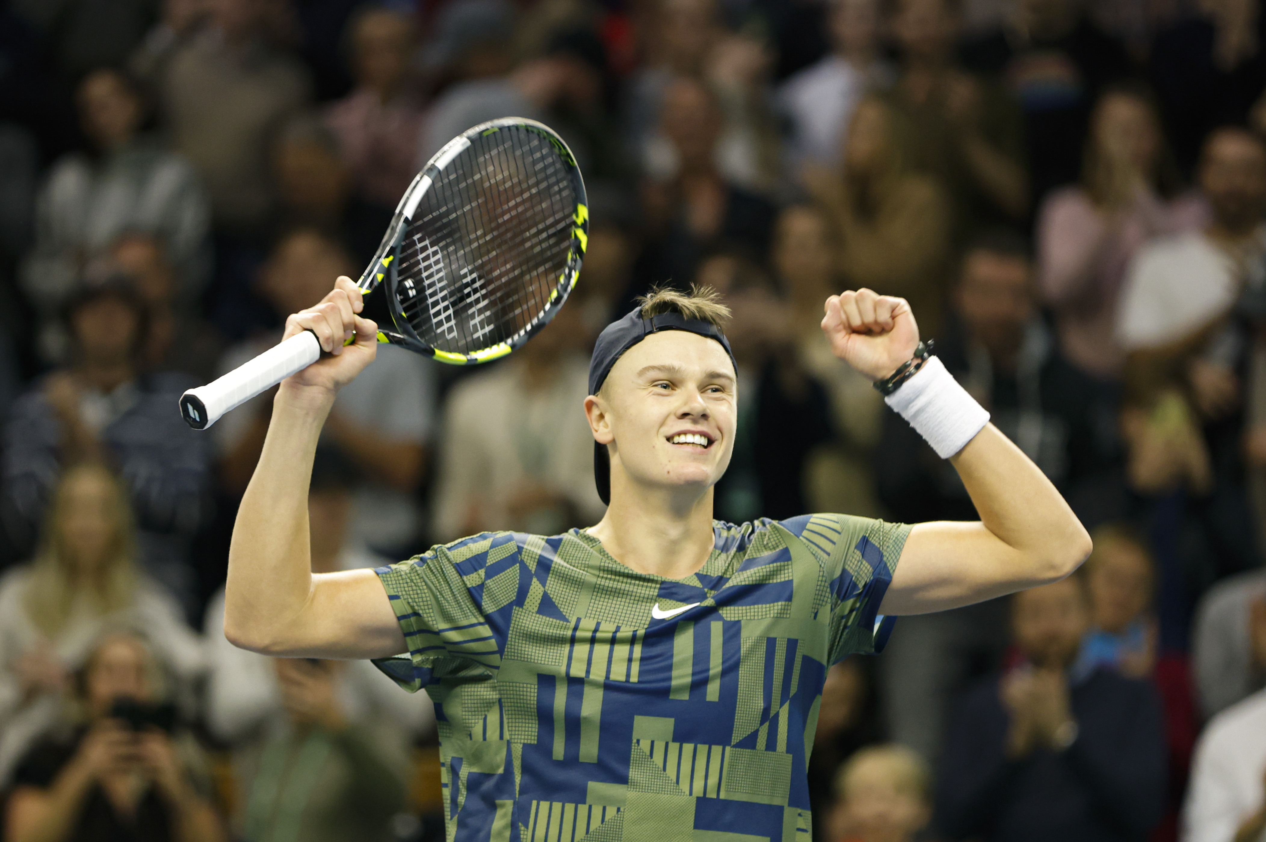 epa10261228 Holger Rune of Denmark celebrates after winning against Stefanos Tsitsipas of Greece in the final match at the Stockholm Open tennis tournament in Stockholm, Sweden, 23 October 2022.  EPA-EFE/Claudio Bresciani SWEDEN OUT