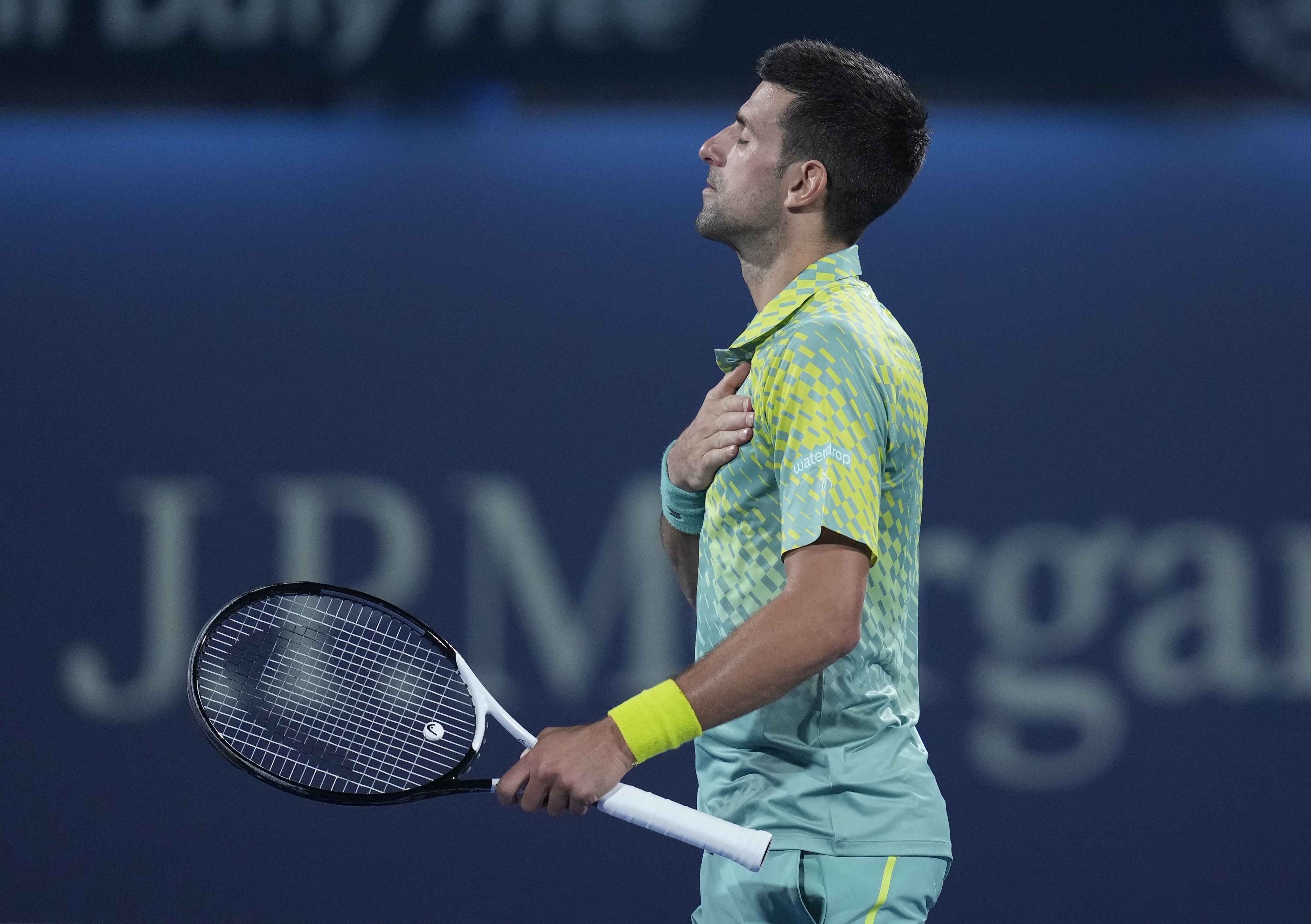 Serbia's Novak Djokovic celebrates after he beats Czech Republic's Tomas Machac during a match of the Dubai Duty Free Tennis Championships in Dubai, United Arab Emirates, Tuesday, Feb 28, 2023. (AP Photo/Kamran Jebreili)