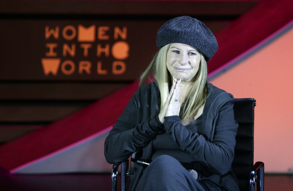 epa04718006 US singer/actress and Co-Founder of the Womens Heart Alliance, Barbra Streisand, addresses the Sixth Annual Women in the World Summit at the David H. Koch Theater at Lincoln Center in New York, New York, USA, 23 April 2015.  EPA/JASON SZENES