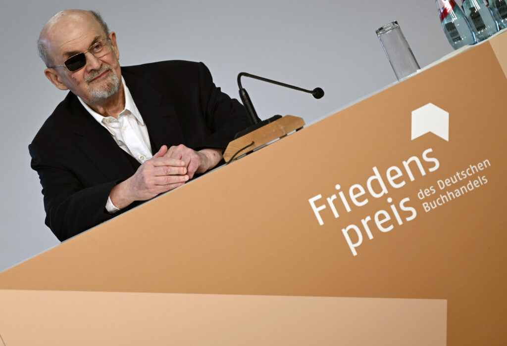 British author Salman Rushdie, winner of this year's Peace Prize of the German Book Trade, arrives at the Frankfurt Book Fair for a press conference, in Frankfurt, Germany, Friday Oct. 20, 2023. (Arne Dedert/dpa via AP)