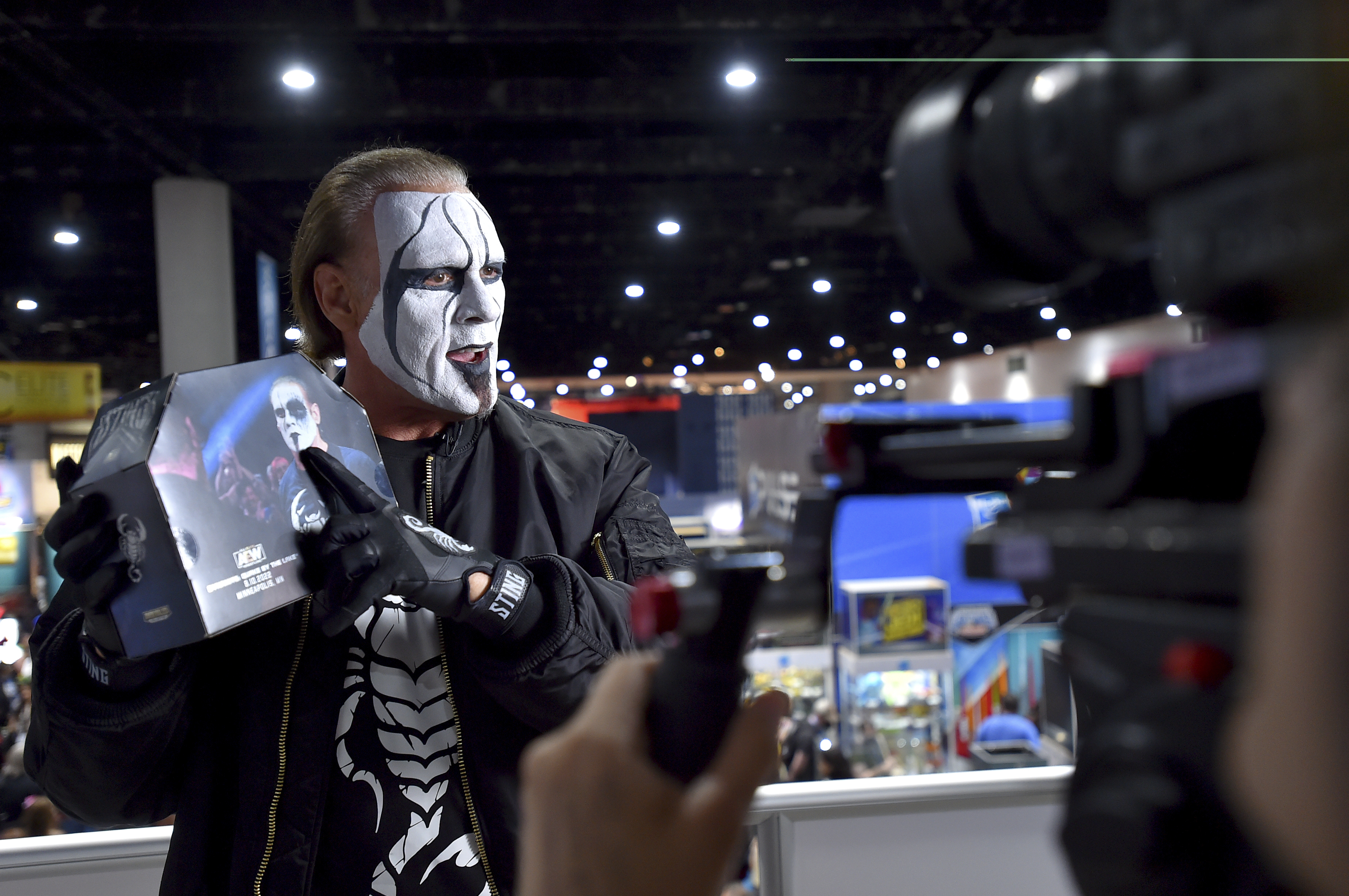 IMAGE DISTRIBUTED FOR JAZWARES, LLC. - Wrestling icon Sting poses at the Jazwares booth with his San Diego Comic-Con exclusive figure on Saturday, July 22, 2023 in San Diego, Calif. (Jordan Strauss/AP Images for Jazwares, LLC.)
