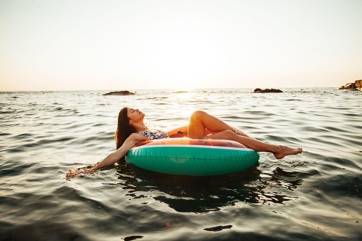 Girl having fun at the beach. Summer Fun Lifestyle.