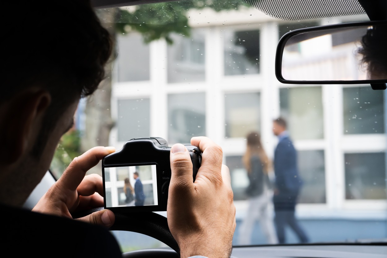 Private Detective Spying. Investigation And Surveillance With Camera,Image: 559281191, License: Royalty-free, Restrictions: , Model Release: yes, Credit line: Andriy Popov / Panthermedia / Profimedia