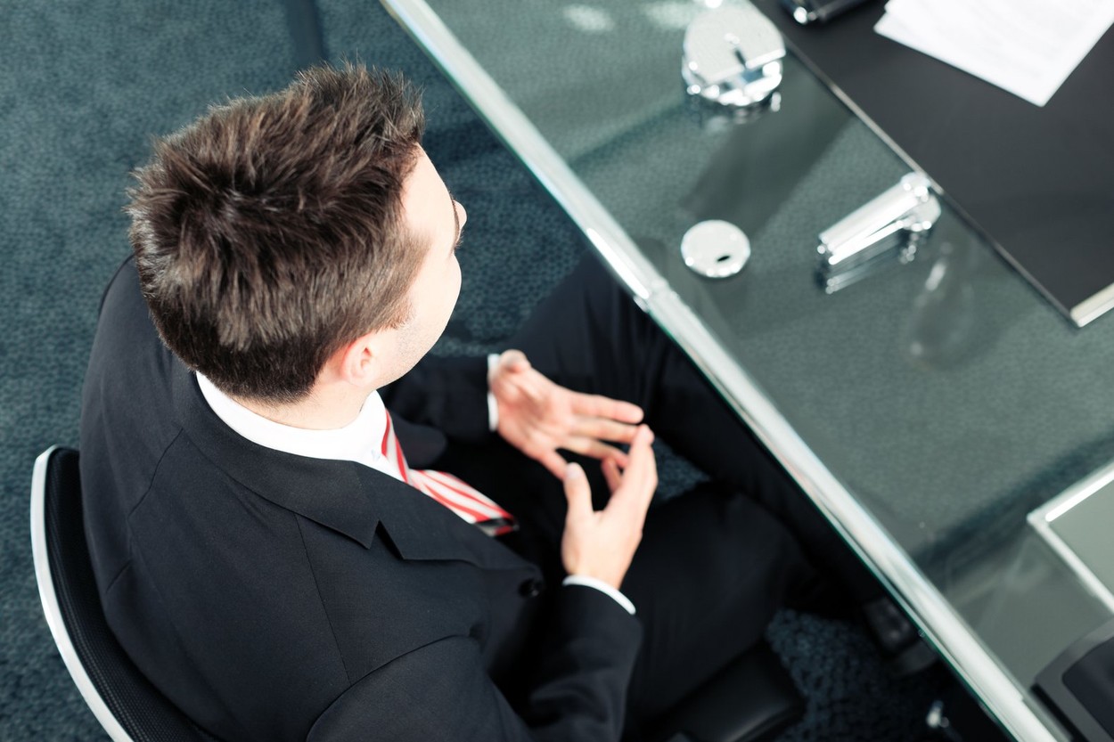 Business - young man sitting in job Interview