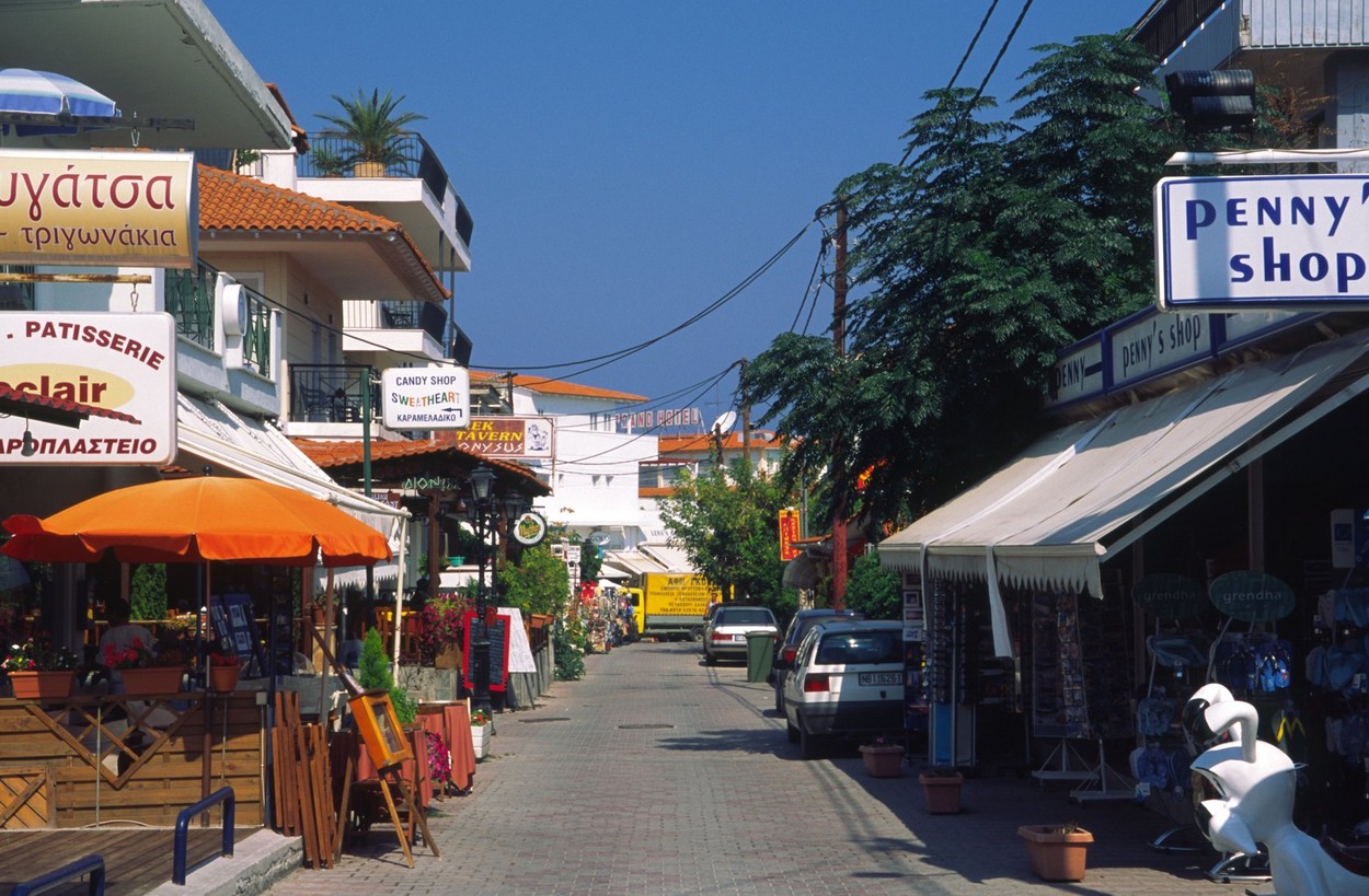 Shops bars and cafes line the narrow streets of Hanioti Kassandria Chalkidiki Greece,Image: 2449695, License: Rights-managed, Restrictions: , Model Release: no, Credit line: Elmtree Images / Alamy / Profimedia