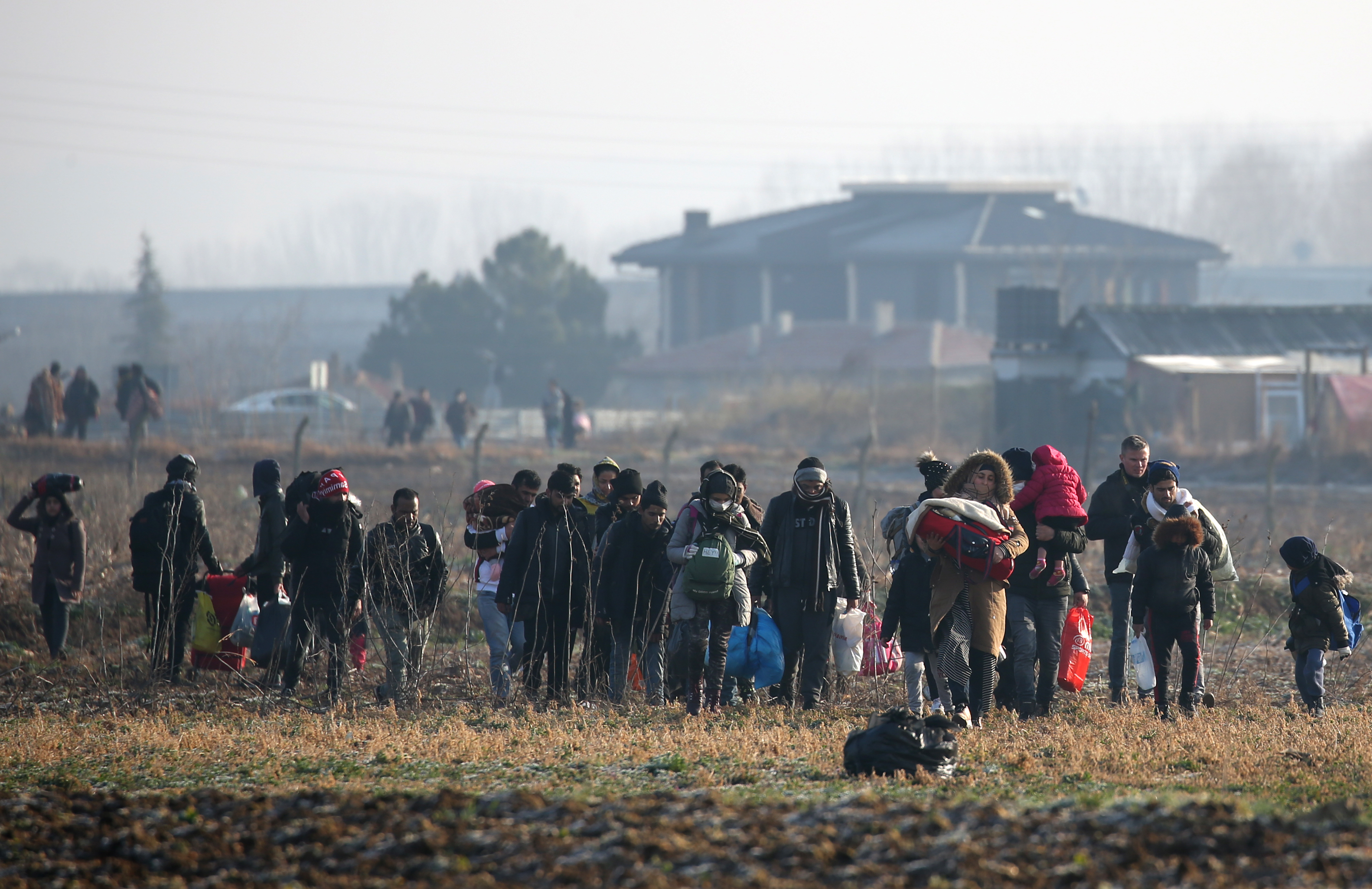 Refugees and migrants gather at Turkish-Greek land border to try to enter Europe
