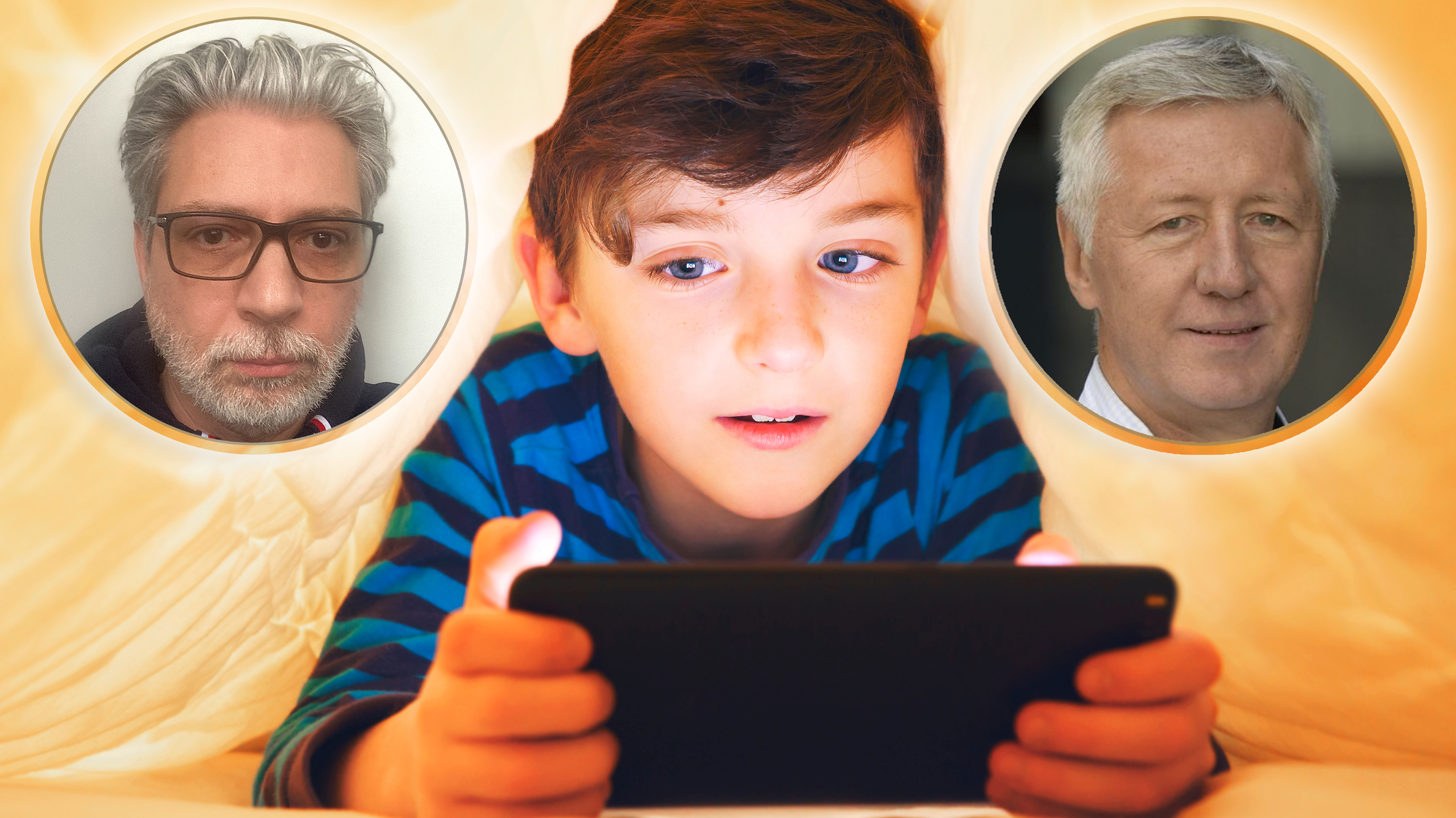 Happy smiling boy sits in bed under a blanket and plays on a smartphone in a game in the dark. The child's face is illuminated by a bright monitor