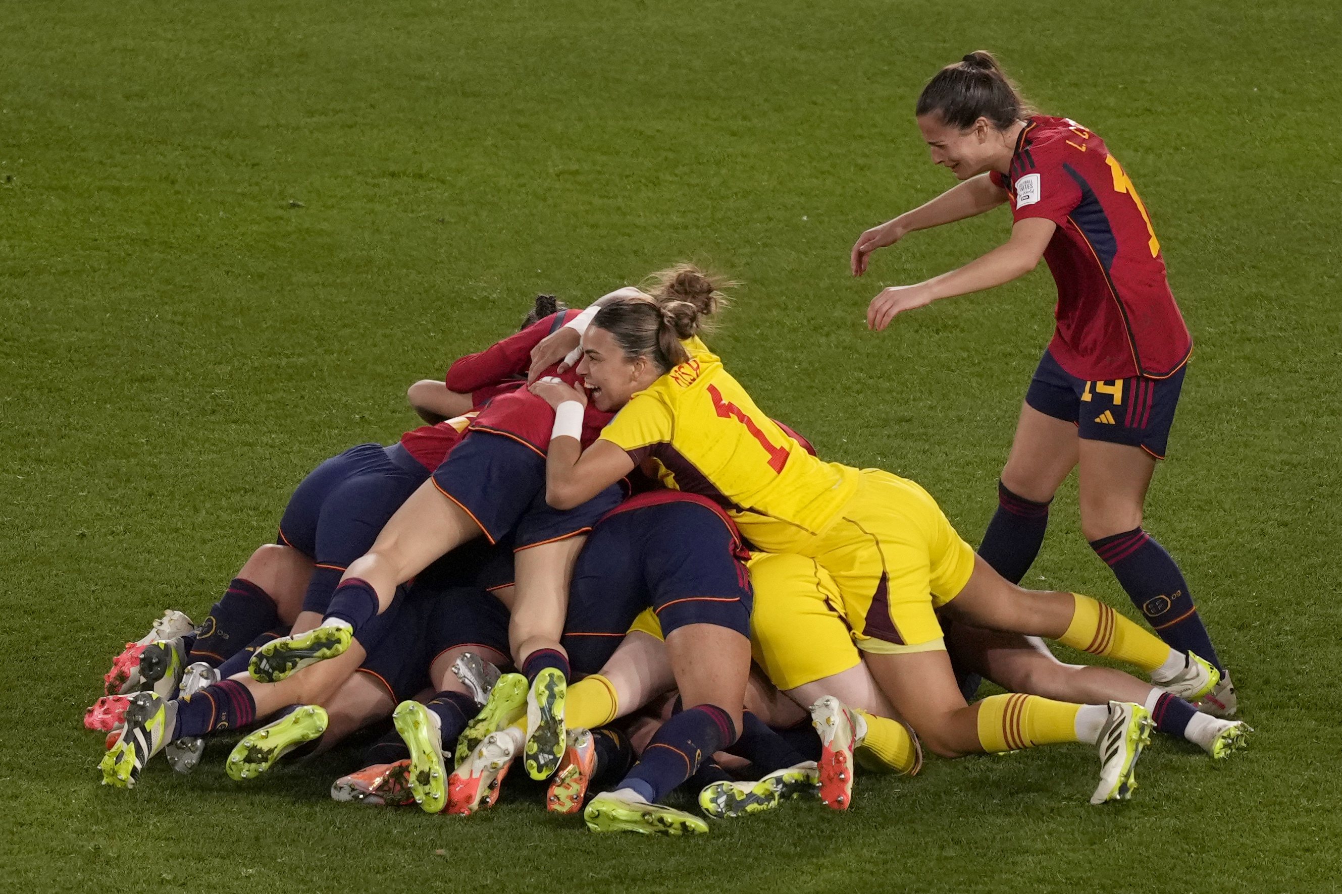 Spain's players celebrate after defeating England during the Women's World Cup soccer final at Stadium Australia in Sydney, Australia, Sunday, Aug. 20, 2023. (AP Photo/Mark Baker)