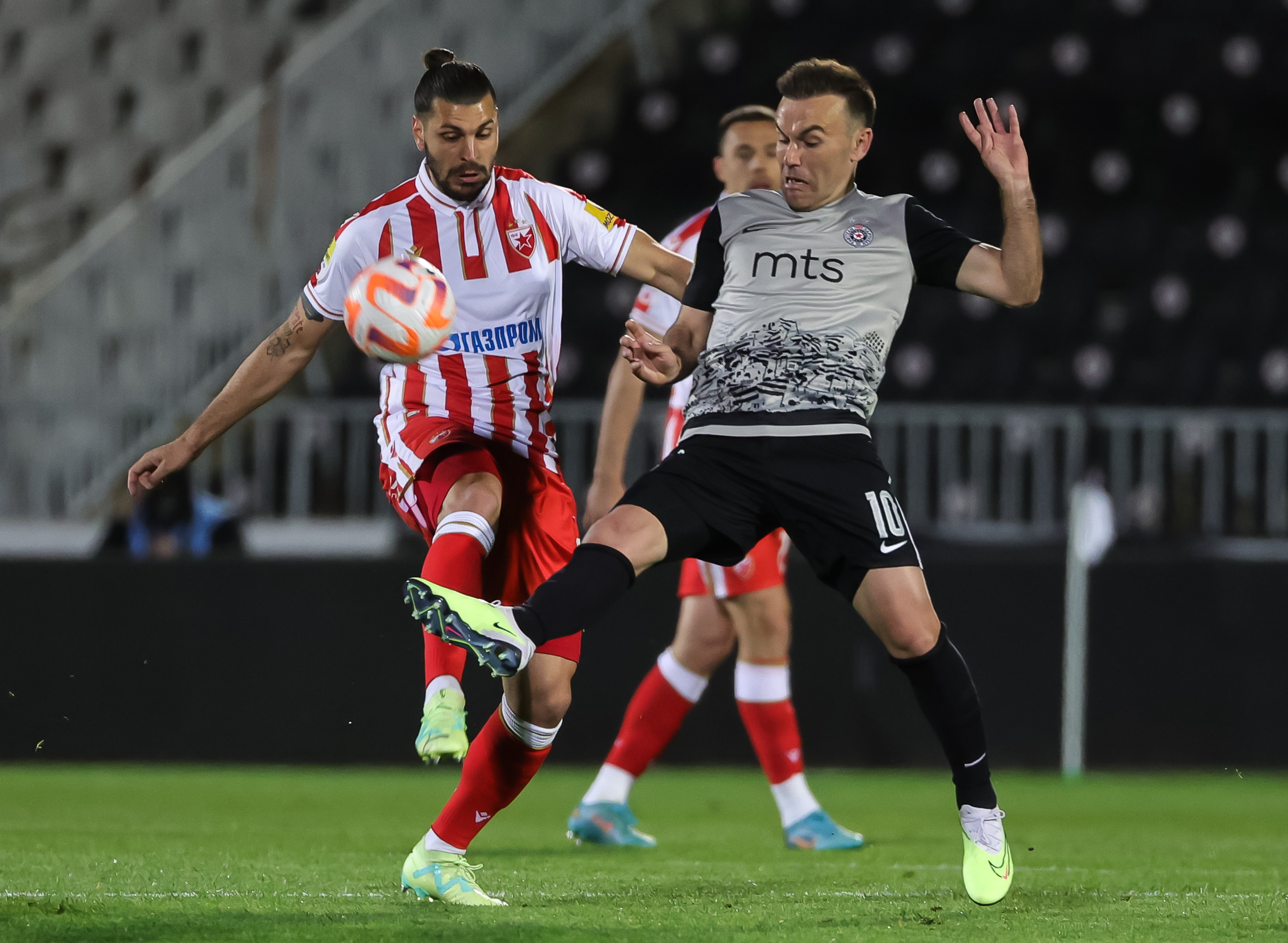 Aleksandar Dragovic (L) and Bibras Natkho Natcho during the Mozzart Super Liga 2022/2023 Play Off match between Partizan and Crvena zvezda on stadium FK Partizan (JNA) on April 26, 2023 in Belgrade, Serbia. (Photo by Srdjan Stevanovic/Starsport.rs ©)