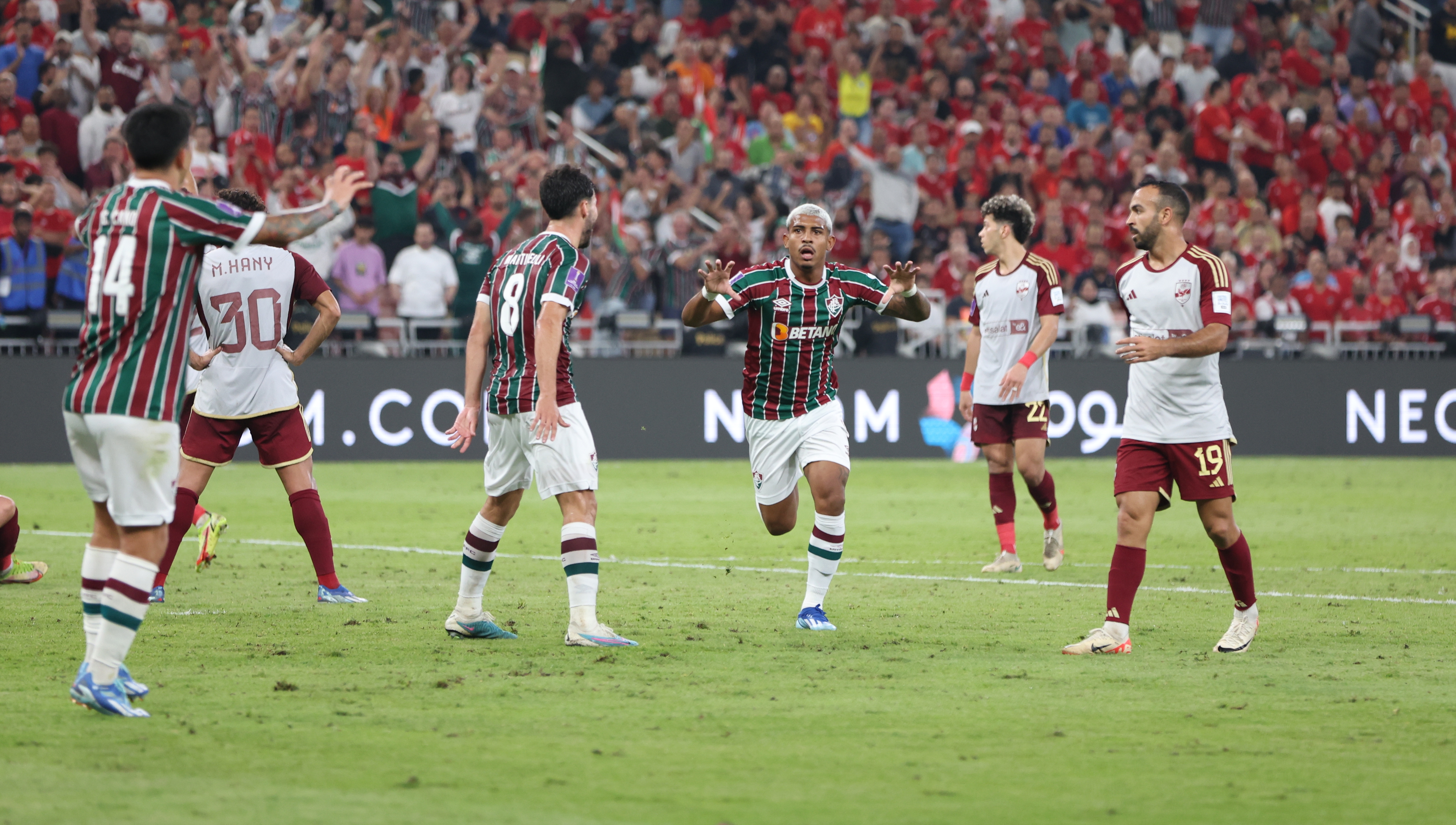 epa11036464 John Kennedy (C) of Fluminense celebrates after scoring the team's second goal during the FIFA Club World Cup 2023 between Fluminense FC and Al Ahly in Jeddah, Saudi Arabia, 18 December 2023.  EPA-EFE/ALI HAIDER