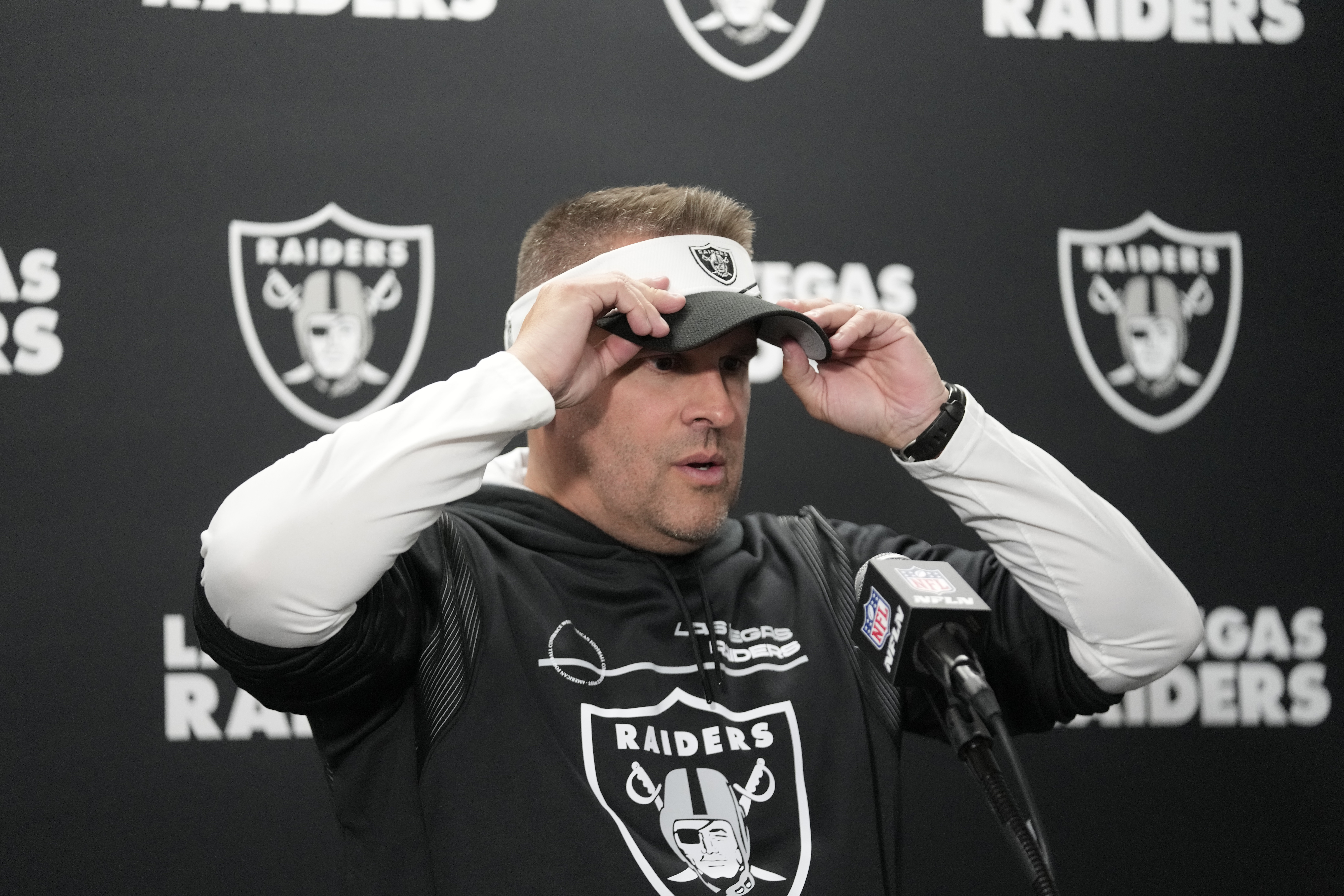 Las Vegas Raiders head coach Josh McDaniels addresses the media after the NFL football game against the Detroit Lions, Monday, Oct. 30, 2023, in Detroit. (AP Photo/Paul Sancya)