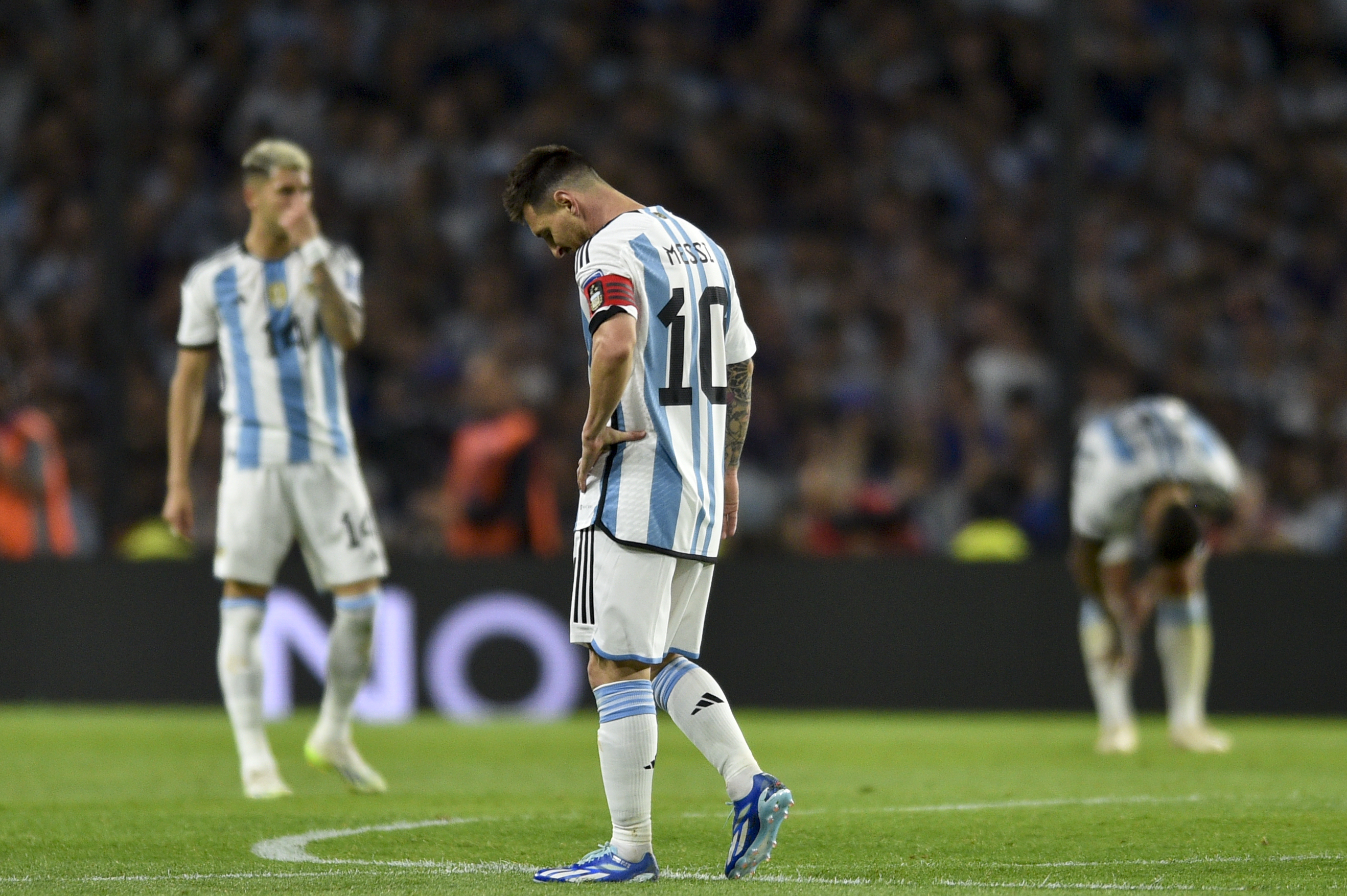 Argentina's Lionel Messi reacts during a qualifying soccer match for the FIFA World Cup 2026 against Uruguay at La Bombonera stadium in Buenos Aires, Argentina, Thursday, Nov. 16, 2023. (AP Photo/Gustavo Garello)