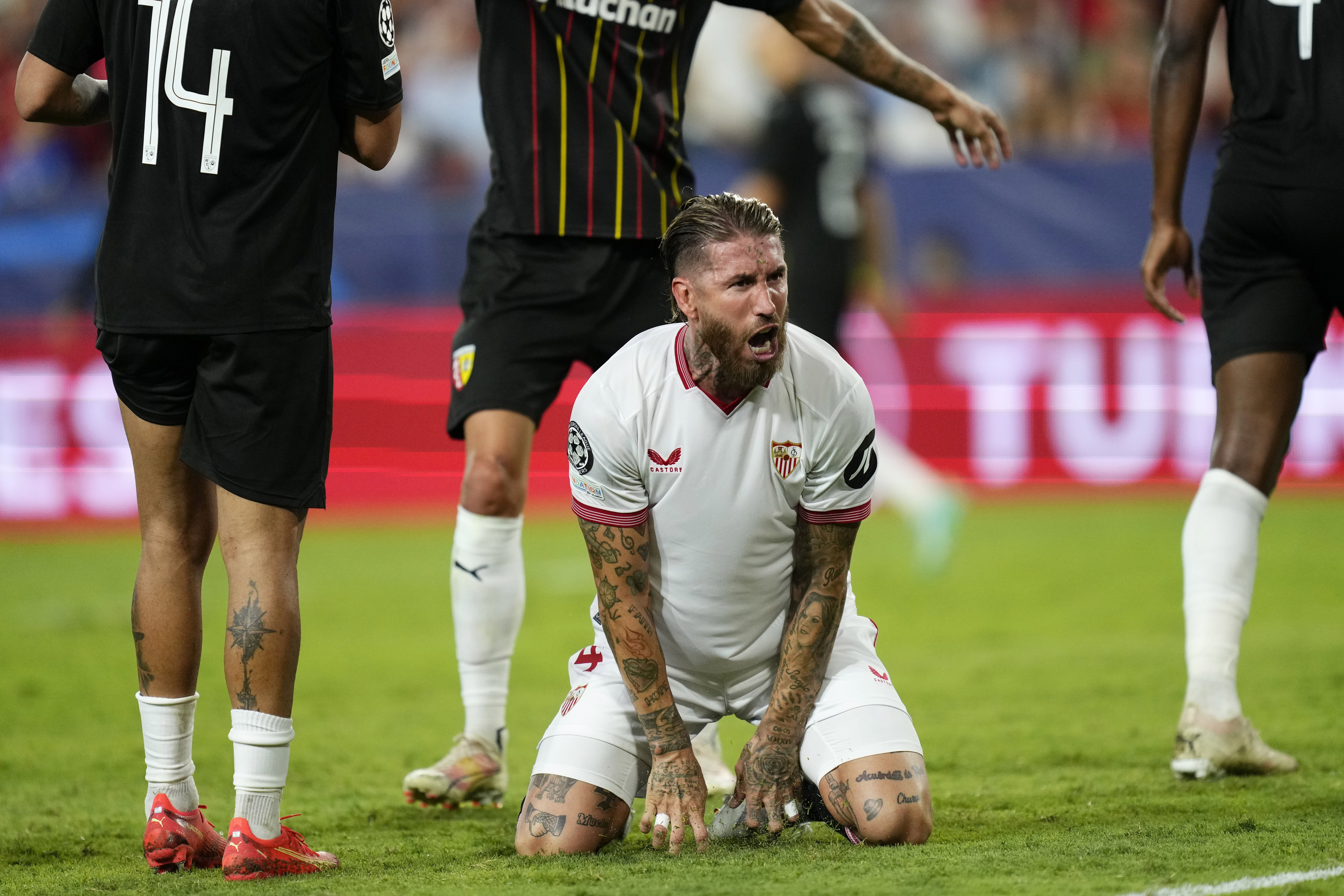 Sevilla's Sergio Ramos reacts during the Champions League Group B soccer match between Sevilla and Lens at the Ramon Sanchez-Pizjuan in Seville, Spain, Wednesday. Sept. 20, 2023. (AP Photo/Jose Breton)