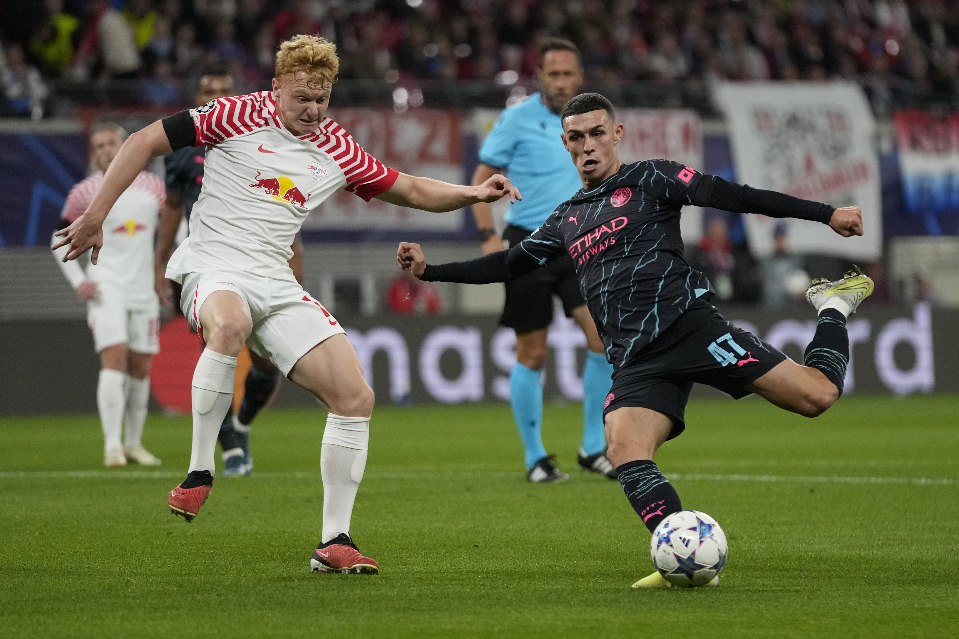 Manchester City's Phil Foden makes an attempt to score during the Champions League group G soccer match between RB Leipzig and Manchester City in Leipzig, Germany, Wednesday, Oct. 4, 2023. (AP Photo/Matthias Schrader)