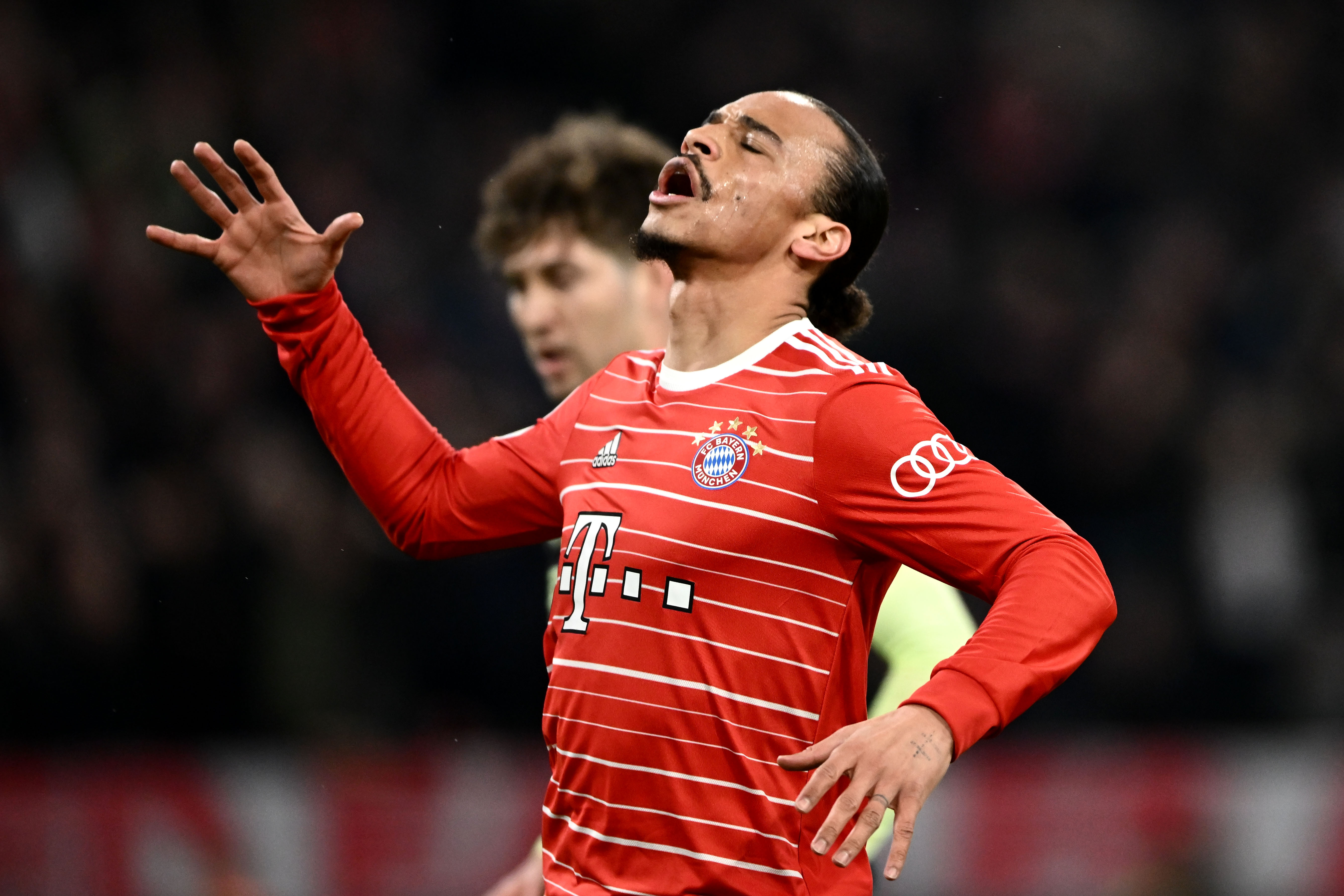 epa10580717 Leroy Sane of Bayern Munich reacts during the UEFA Champions League quarter final, 2nd leg match between Bayern Munich and Manchester City in Munich, Germany, 19 April 2023.  EPA-EFE/CHRISTIAN BRUNA